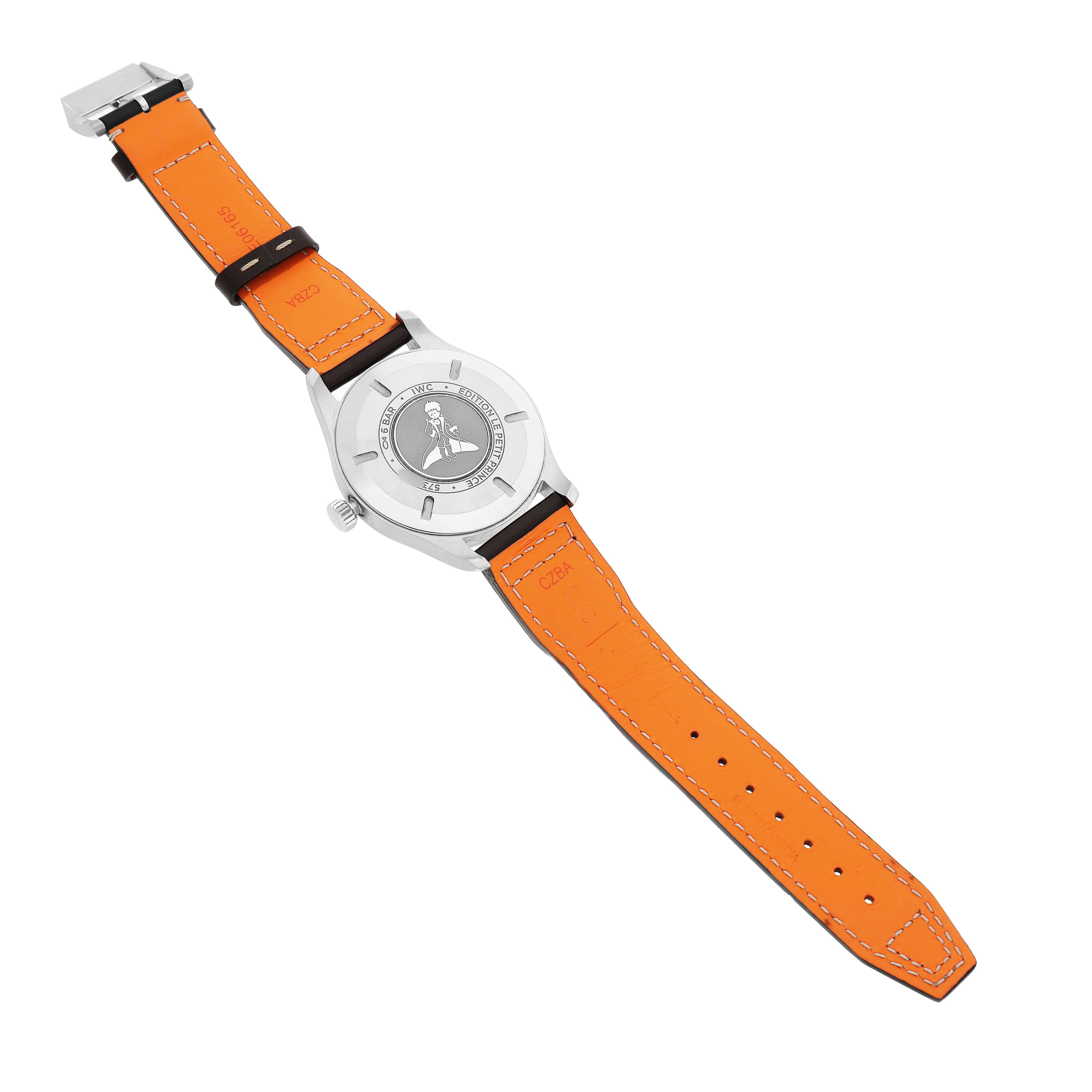 The image shows the back view of an IWC Pilot IW327010 Men's Stainless Steel Blue Dial model watch, detailing its case back and orange leather strap.