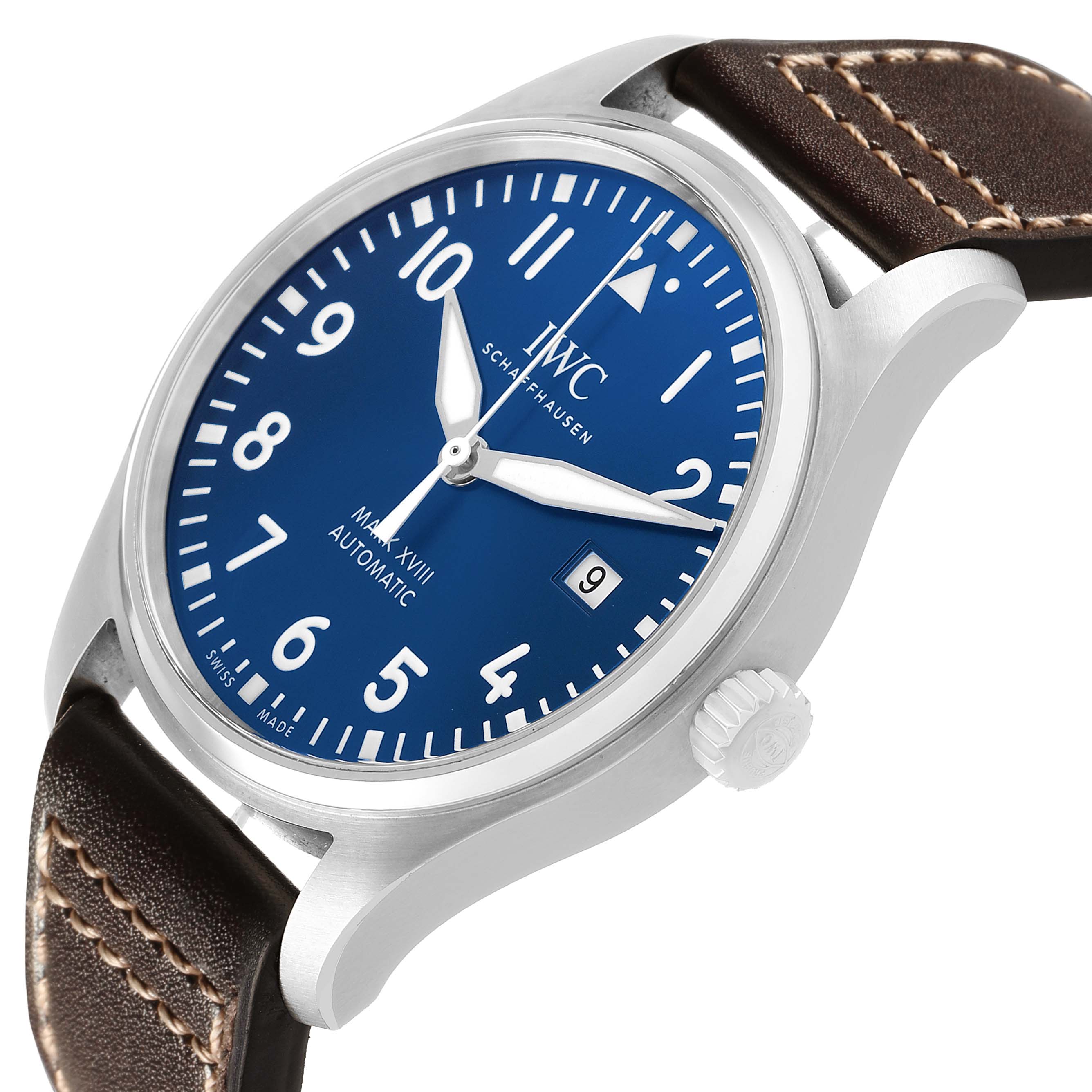 The IWC Pilot IW327010 Men's Stainless Steel Blue Dial watch is shown at an angled view, highlighting its dial, bezel, crown, and leather strap.