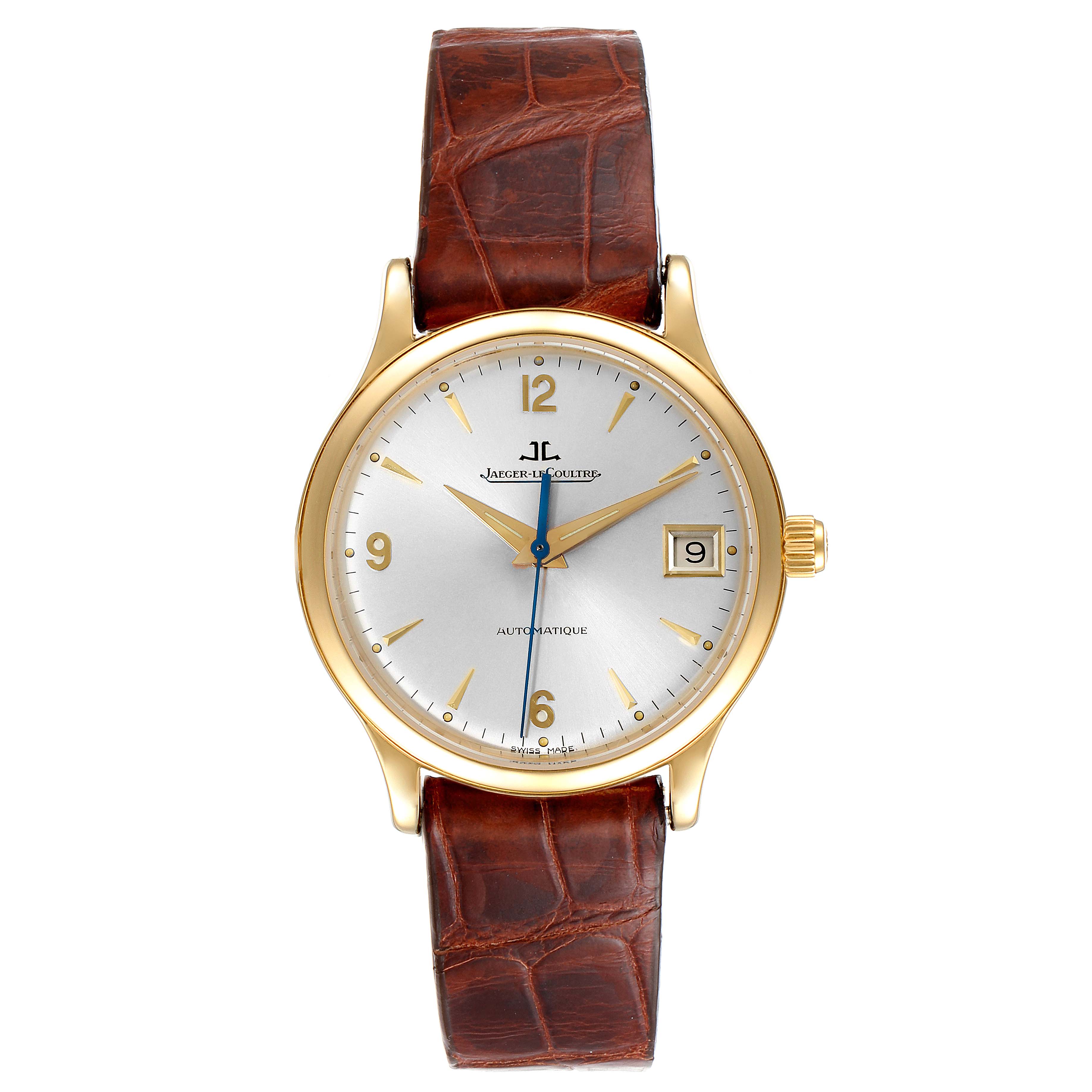 The image shows a front view of the Jaeger LeCoultre Master 145.1.89 Men's Yellow Gold Silver Dial 145.1.89 Men's Yellow Gold Silver Dial model watch, highlighting its dial, case, and brown leather strap.