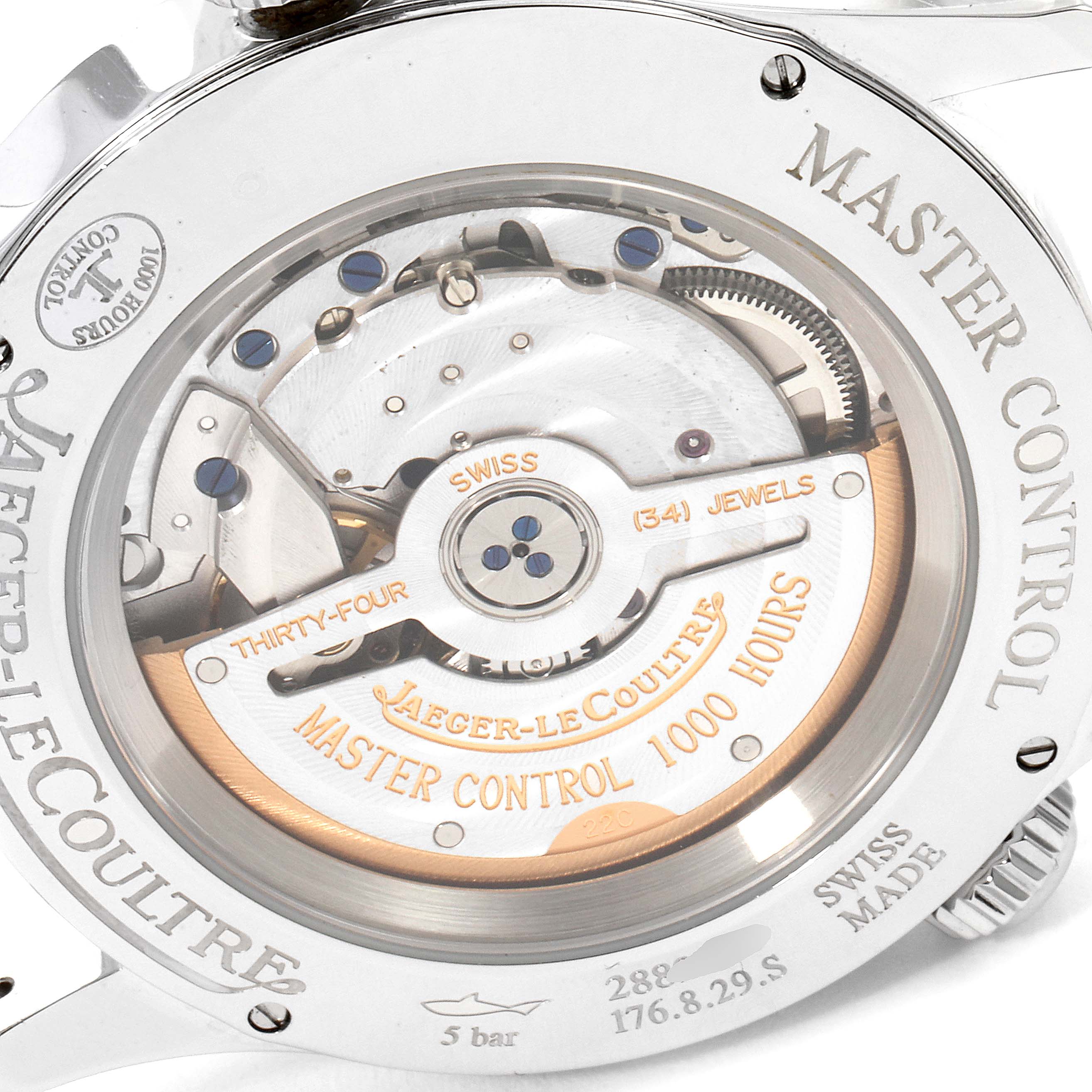 This is a close-up shot of the back case of a Jaeger-LeCoultre Master Control watch, showcasing its movement mechanism.