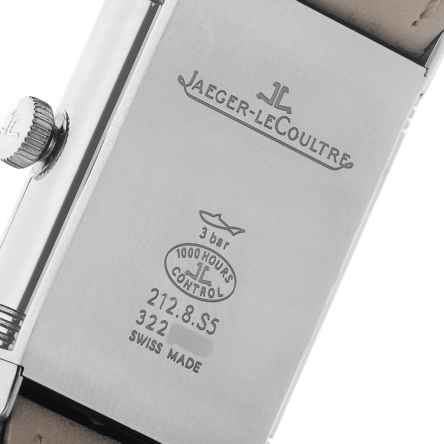 The image shows the back of the Jaeger LeCoultre Reverso Q2538420 Men's Stainless Steel Silver Dial watch, highlighting the brand engravings and crown from a side angle.