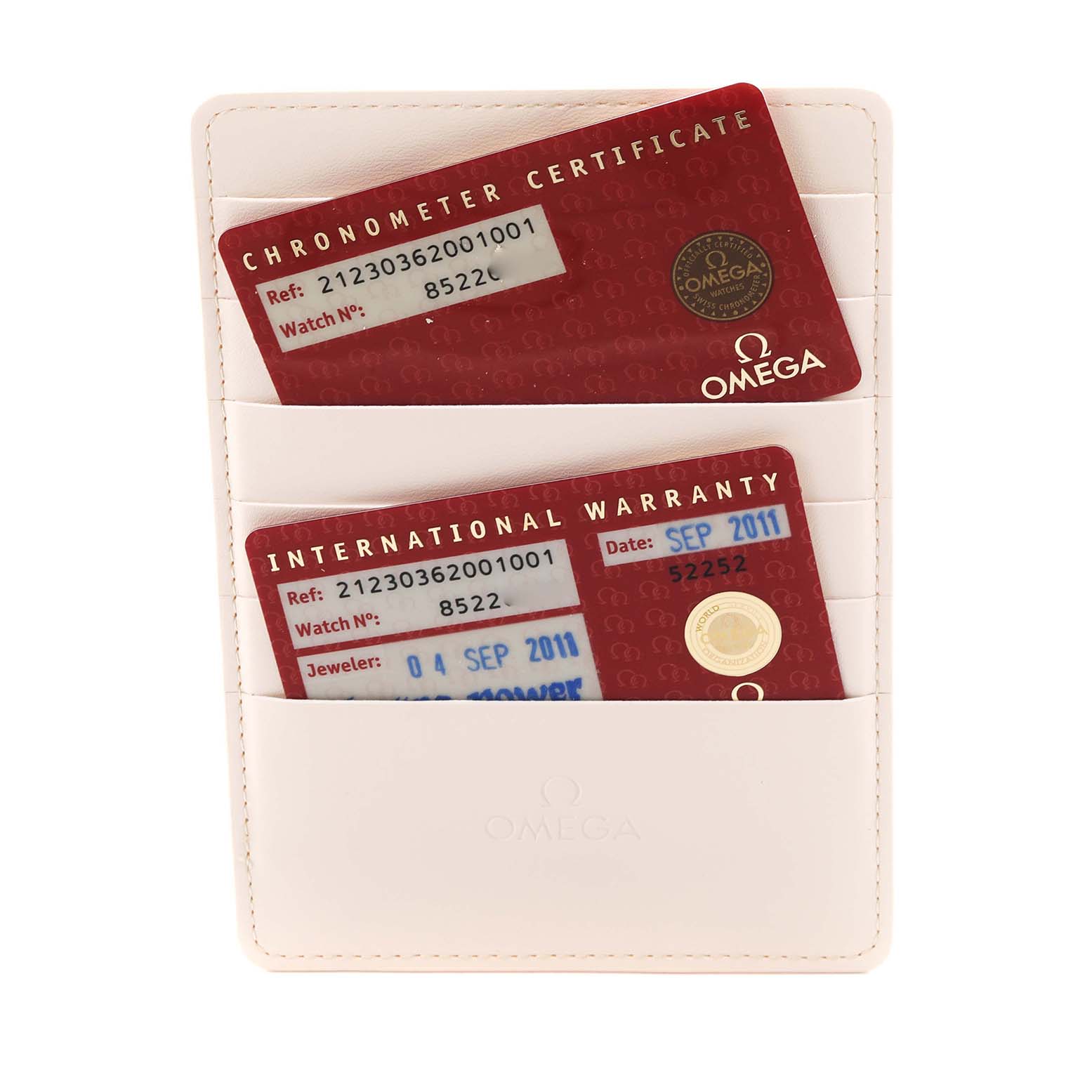 The image shows Omega Seamaster 212.30.36.20.01.001 Men
s Stainless Steel Black Dial 212.30.36.20.01.001 Men
s Stainless Steel Black Dial watch accessories—international warranty and chronometer certificate cards in a holder.