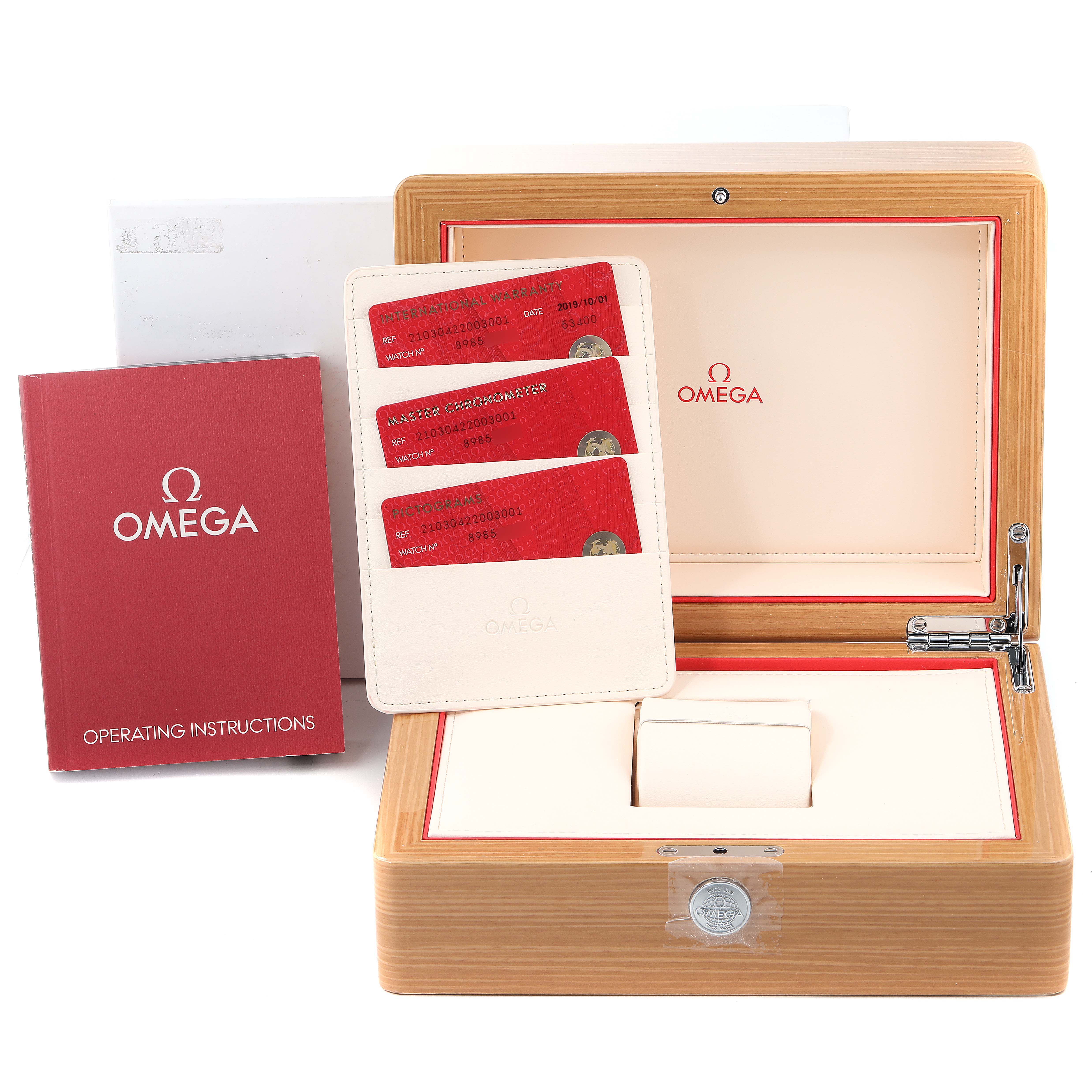 The image shows the accessories of an Omega Seamaster 210.30.42.20.03.001 Men's Stainless Steel Blue Dial 210.30.42.20.03.001 Men's Stainless Steel Blue Dial watch, including its box, operating instructions, and master chronometer cards.