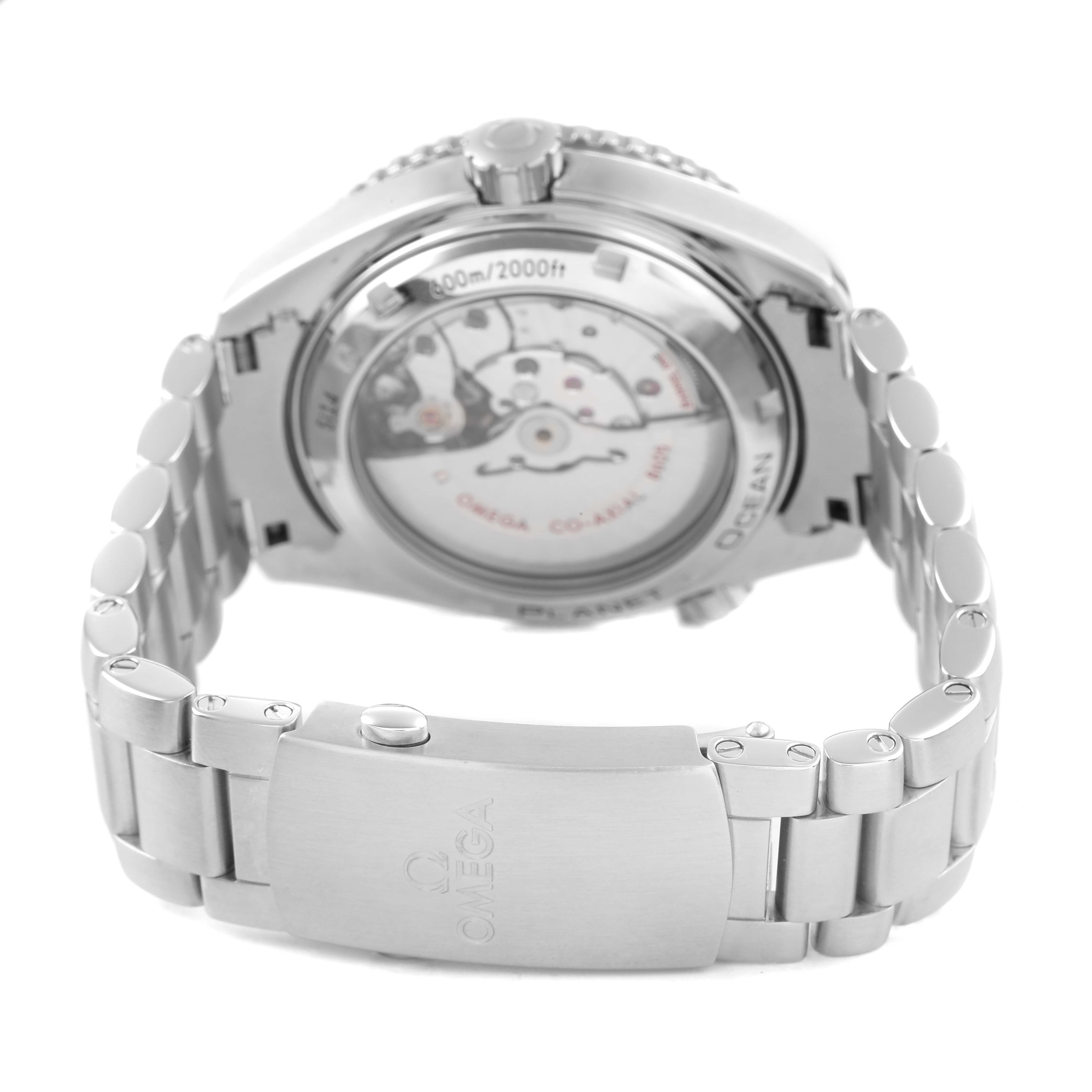 The image shows the back view of an Omega Planet Ocean 232.30.44.22.01.002 Men's Stainless Steel Black Dial, highlighting the case back, bracelet, and clasp.