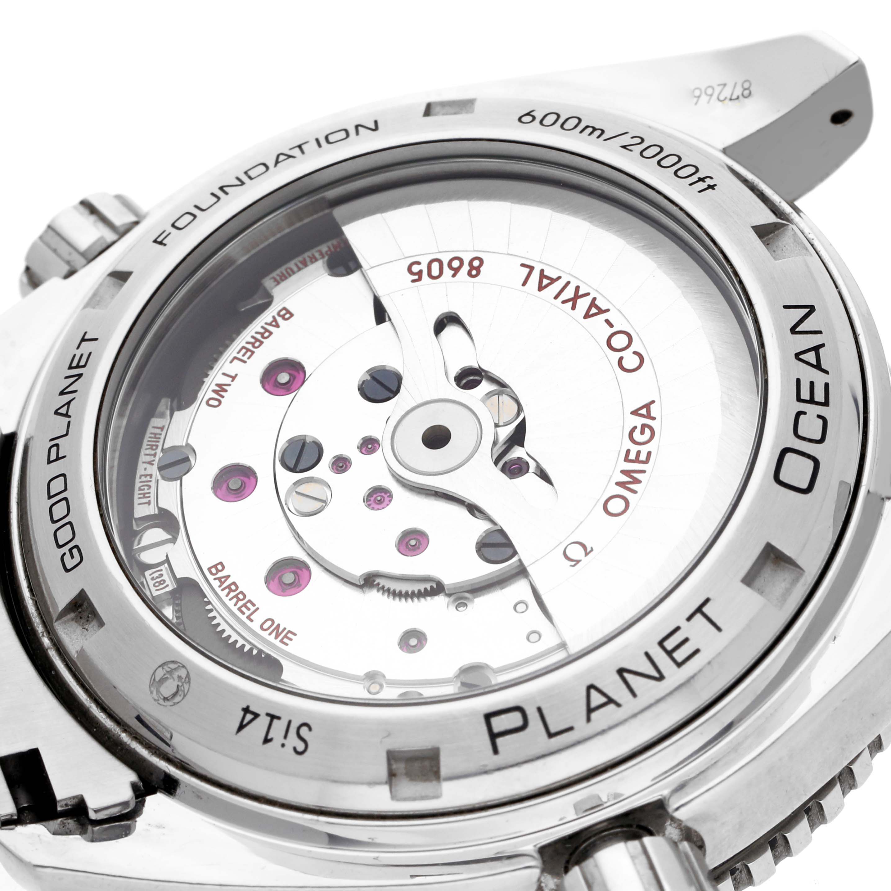 The image shows the back of the Omega Planet Ocean 232.30.44.22.03.001 Men
s Stainless Steel Blue Dial 232.30.44.22.03.001 Men
s Stainless Steel Blue Dial watch, highlighting the movement and engraved details.