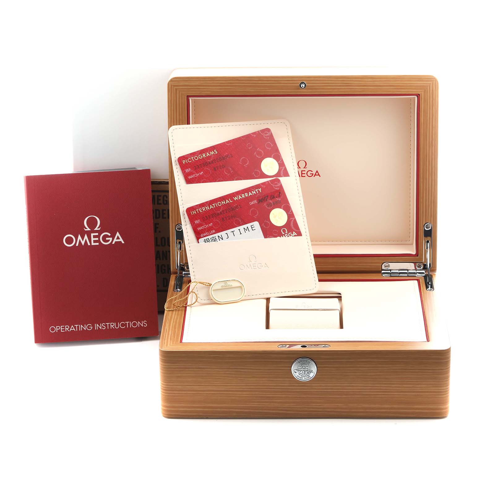 The image shows the Omega Planet Ocean 232.30.44.22.03.001 Men
s Stainless Steel Blue Dial 232.30.44.22.03.001 Men
s Stainless Steel Blue Dial watch packaging, with a wooden box, instruction manual, and warranty cards.