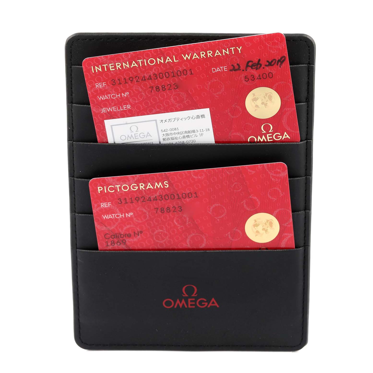 This image shows the Omega Speedmaster 311.92.44.30.01.001 Men's Ceramic Black Dial 311.92.44.30.01.001 Men's Ceramic Black Dial model's international warranty and pictogram cards in a black cardholder.