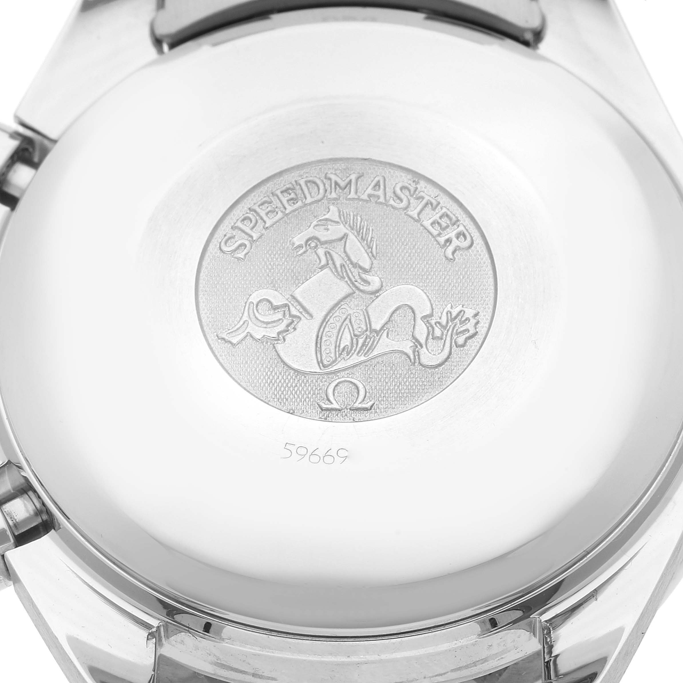 This image shows the back case of an Omega Speedmaster 3513.54.00 Men's Stainless Steel Black Dial 3513.54.00 Men's Stainless Steel Black Dial watch, featuring its engraved logo and text.