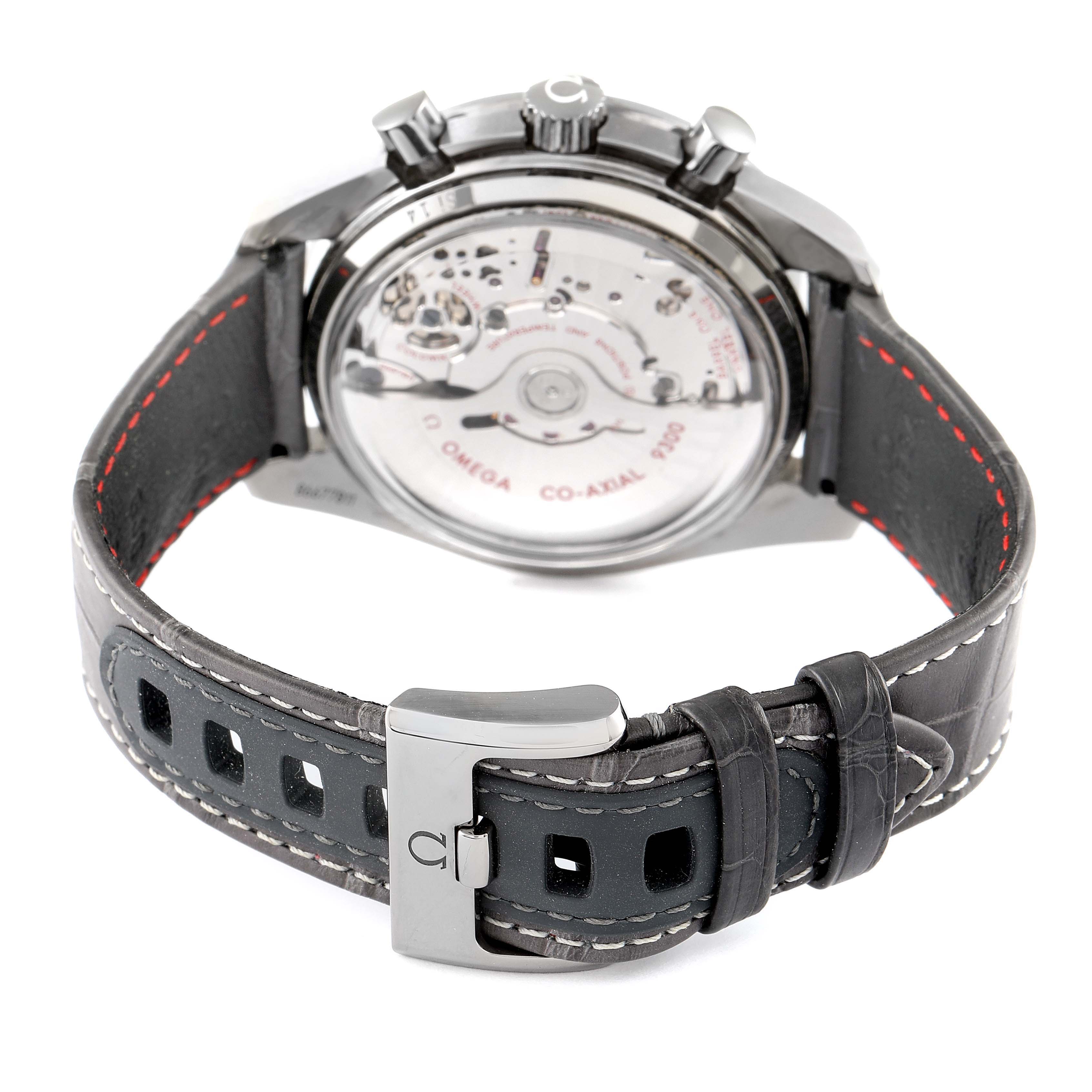 The image shows the back view of an Omega Speedmaster 311.93.44.51.99.001 Men's Ceramic Silver Dial 311.93.44.51.99.001 Men's Ceramic Silver Dial watch, highlighting its movement and leather strap with buckle.