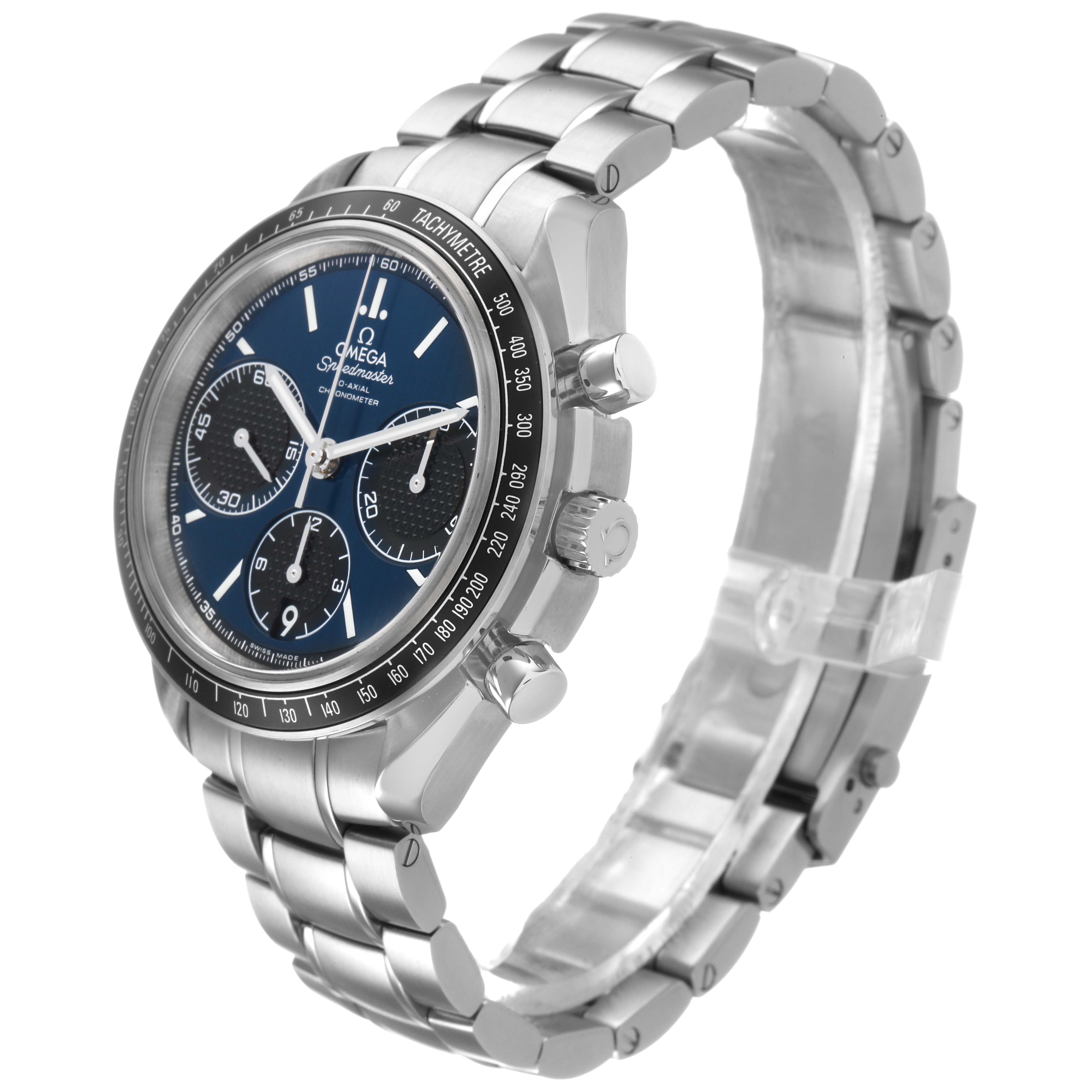 The Omega Speedmaster 326.30.40.50.03.001 Men's Stainless Steel Blue Dial model is shown at a three-quarter angle, highlighting the dial, tachymeter bezel, and metal bracelet.