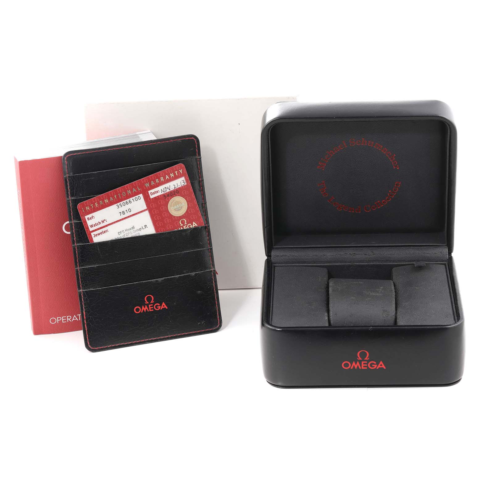The image shows the Omega Speedmaster 3506.61.00 Men's Stainless Steel Red Dial 3506.61.00 Men's Stainless Steel Red Dial watch box, warranty card holder, and an instruction booklet.