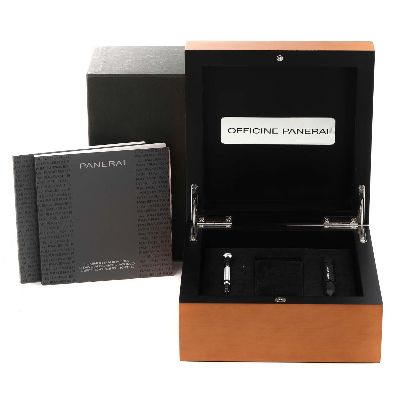 The image shows the open box and manuals for the Panerai Luminor PAM00523 Men
s Stainless Steel White Dial PAM00523 Men
s Stainless Steel White Dial model, with accessories and documentation included.