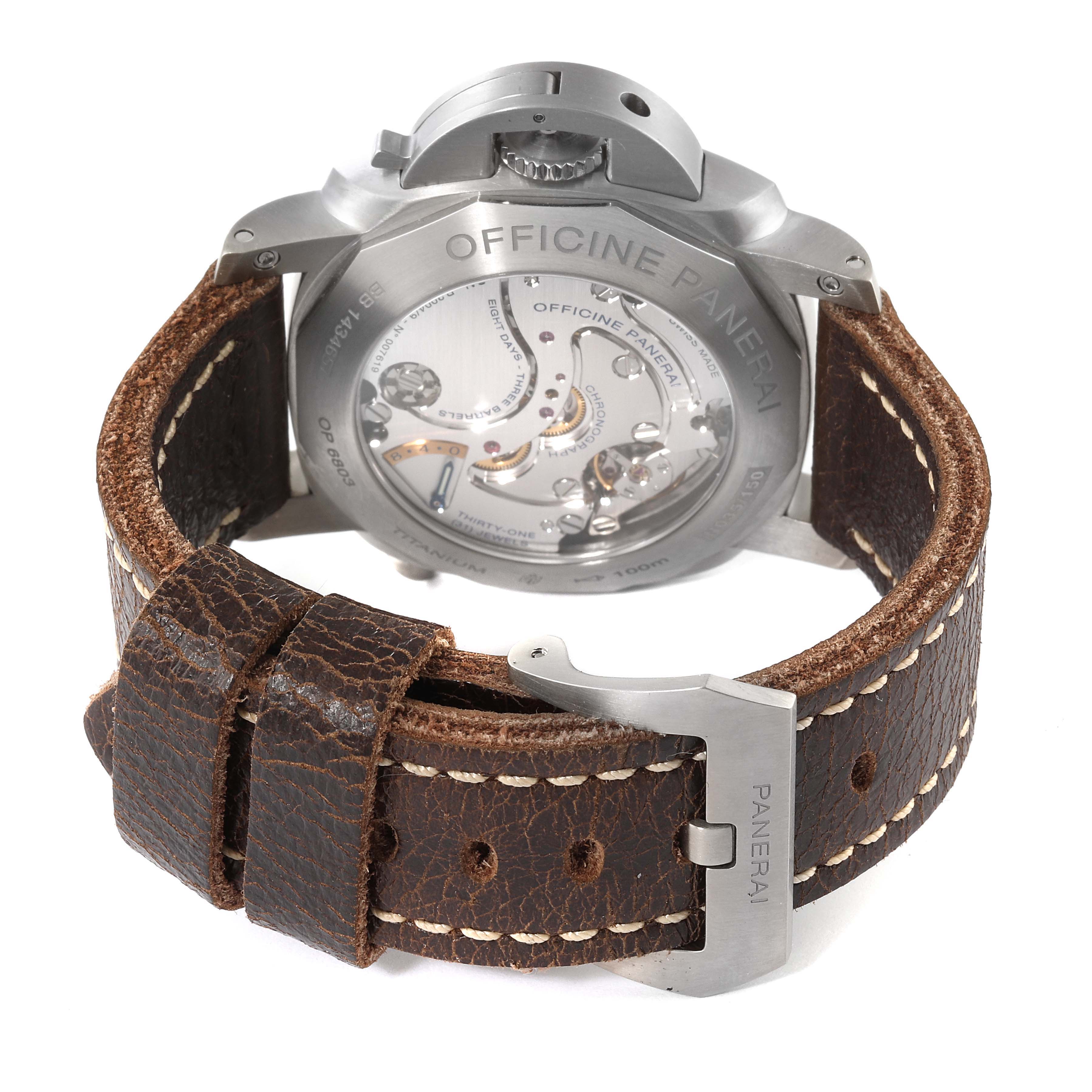 The image shows the back and strap of a Panerai Luminor PAM00345 Men's Titanium Black Dial PAM00345 Men's Titanium Black Dial watch, highlighting its movement and buckle.