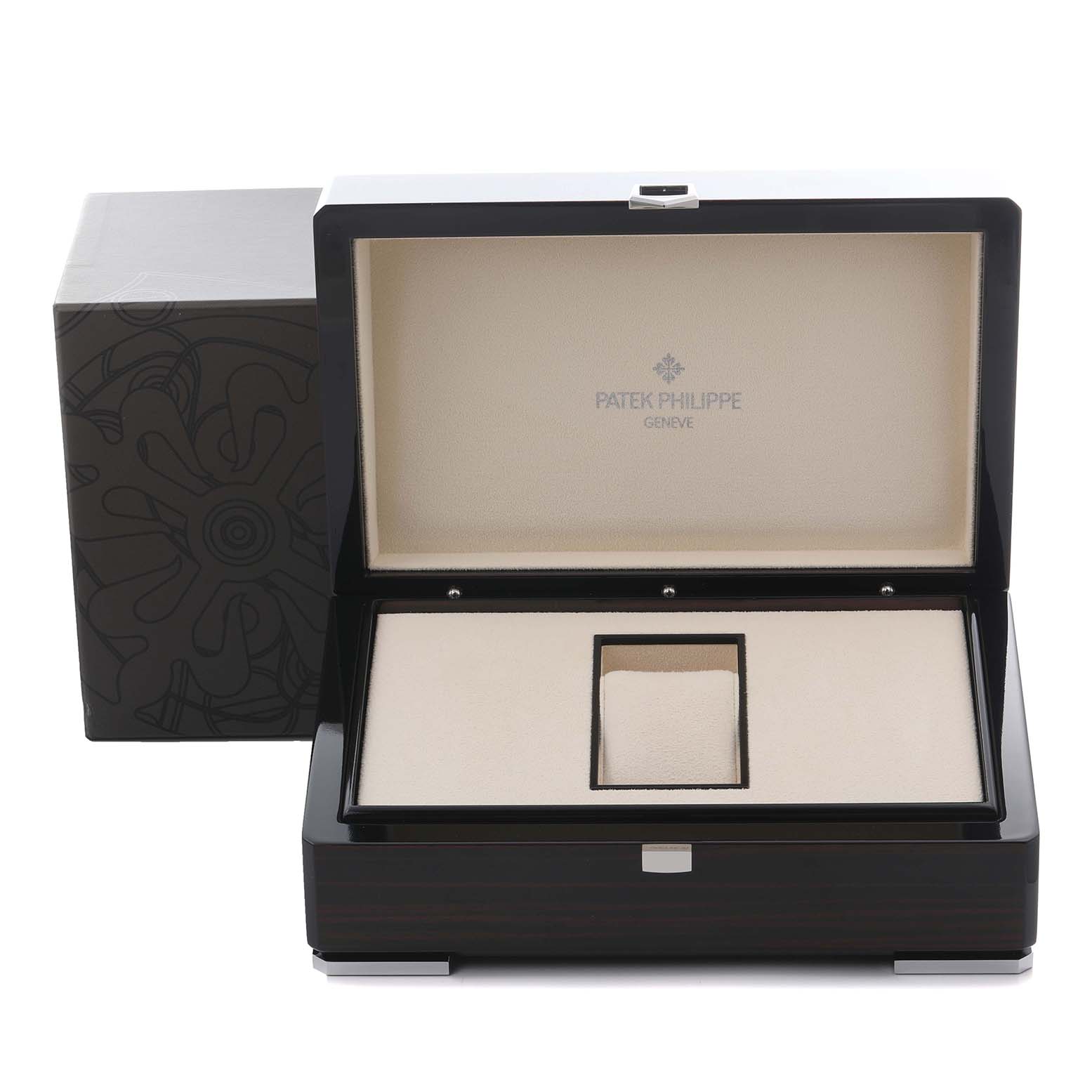 The image shows an open presentation box for a Patek Philippe Aquanaut 5065J Men's Yellow Gold Black Dial 5065J Men's Yellow Gold Black Dial, displaying its interior and the brand logo.