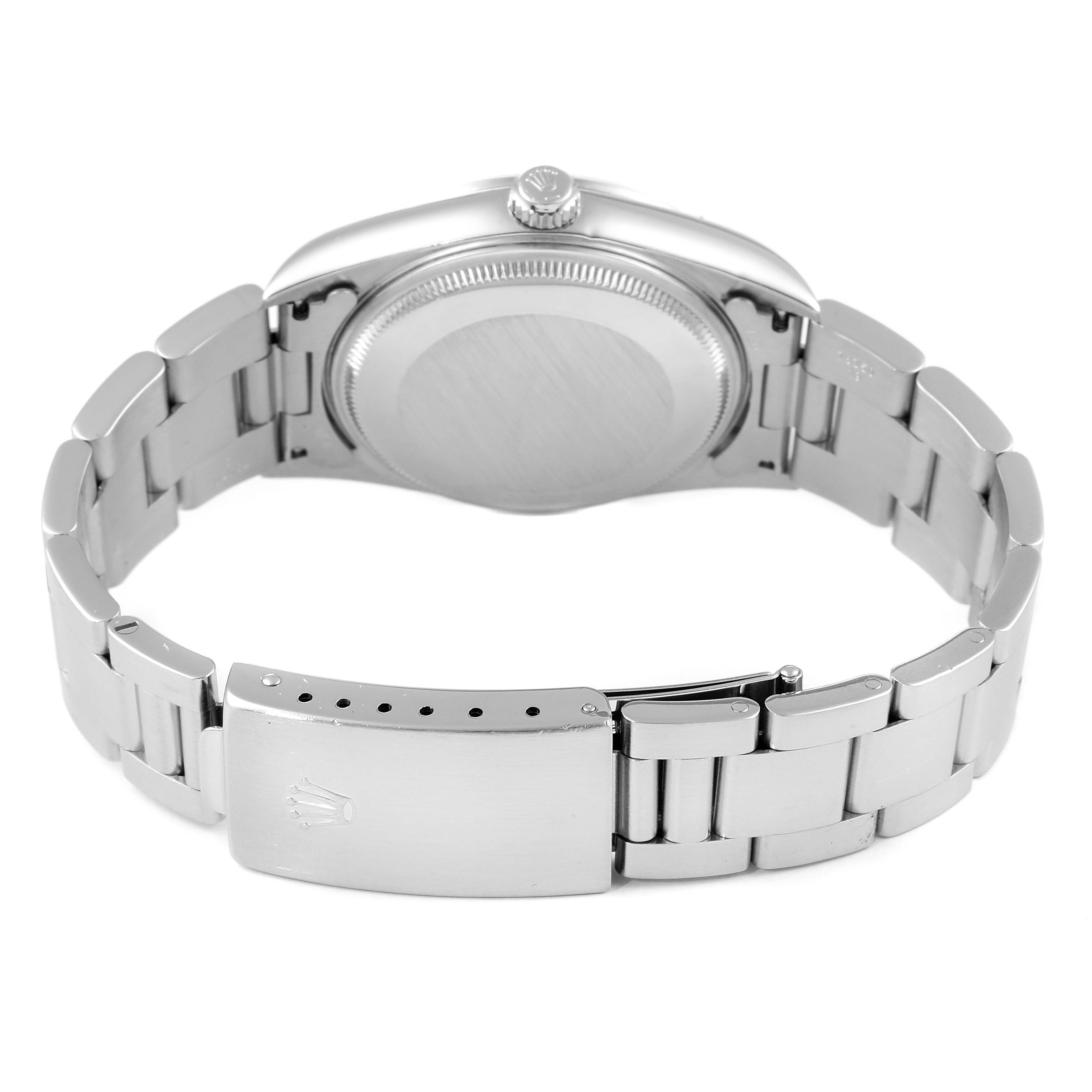 This image shows the back view of a Rolex Air-King 14000 Men's Stainless Steel Black Dial 14000 Men's Stainless Steel Black Dial watch, highlighting its case back and bracelet with a clasp.