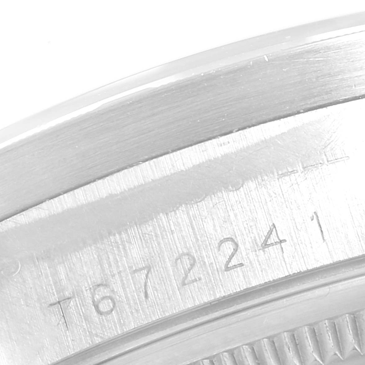 The image displays a close-up of the case engraving on a Rolex Air-King 14010 Men's Stainless Steel Blue Dial 14010 Men's Stainless Steel Blue Dial watch, specifically showing the serial number.