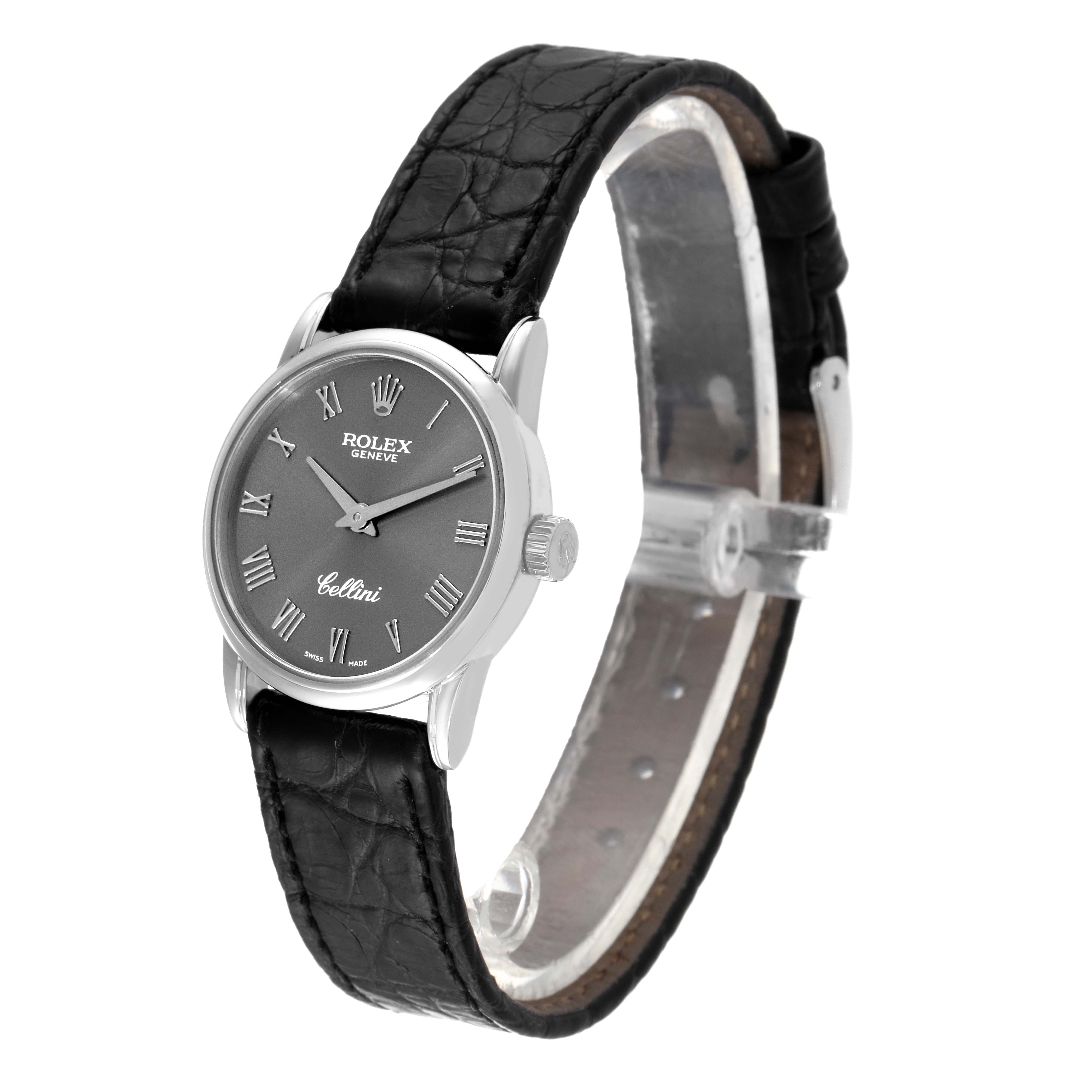 The image shows a Rolex Cellini 6111 Women's White Gold Grey Dial 6111 Women's White Gold Grey Dial watch from an angled side view, displaying the dial, case, crown, and leather strap.