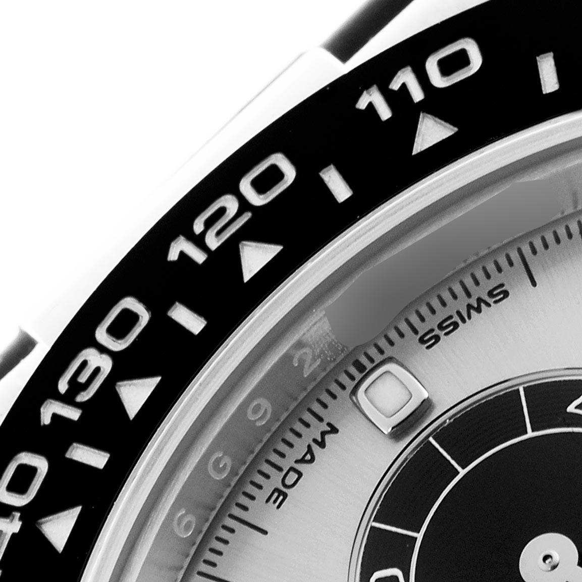 The image shows a close-up of the bezel and dial edge of a Rolex Daytona 116519 Men's White Gold Silver Dial 116519 Men's White Gold Silver Dial watch, highlighting the tachymetric scale.