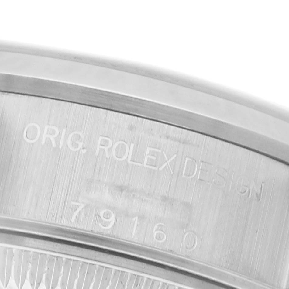The image shows a close-up of the side casing of a Rolex Date 79160 Women's Stainless Steel Black Dial 79160 Women's Stainless Steel Black Dial watch, displaying the "ORIG. ROLEX DESIGN" engraving and model number.