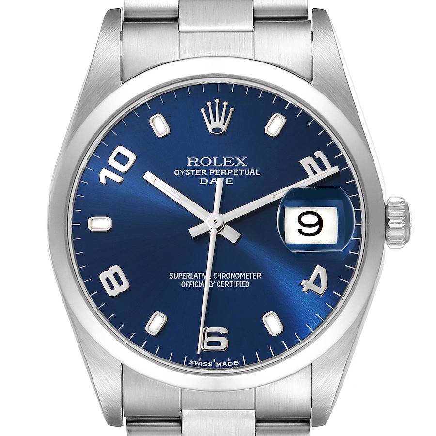 The Rolex Date model is shown from the front, highlighting its blue dial, silver indices, and cyclops date window.