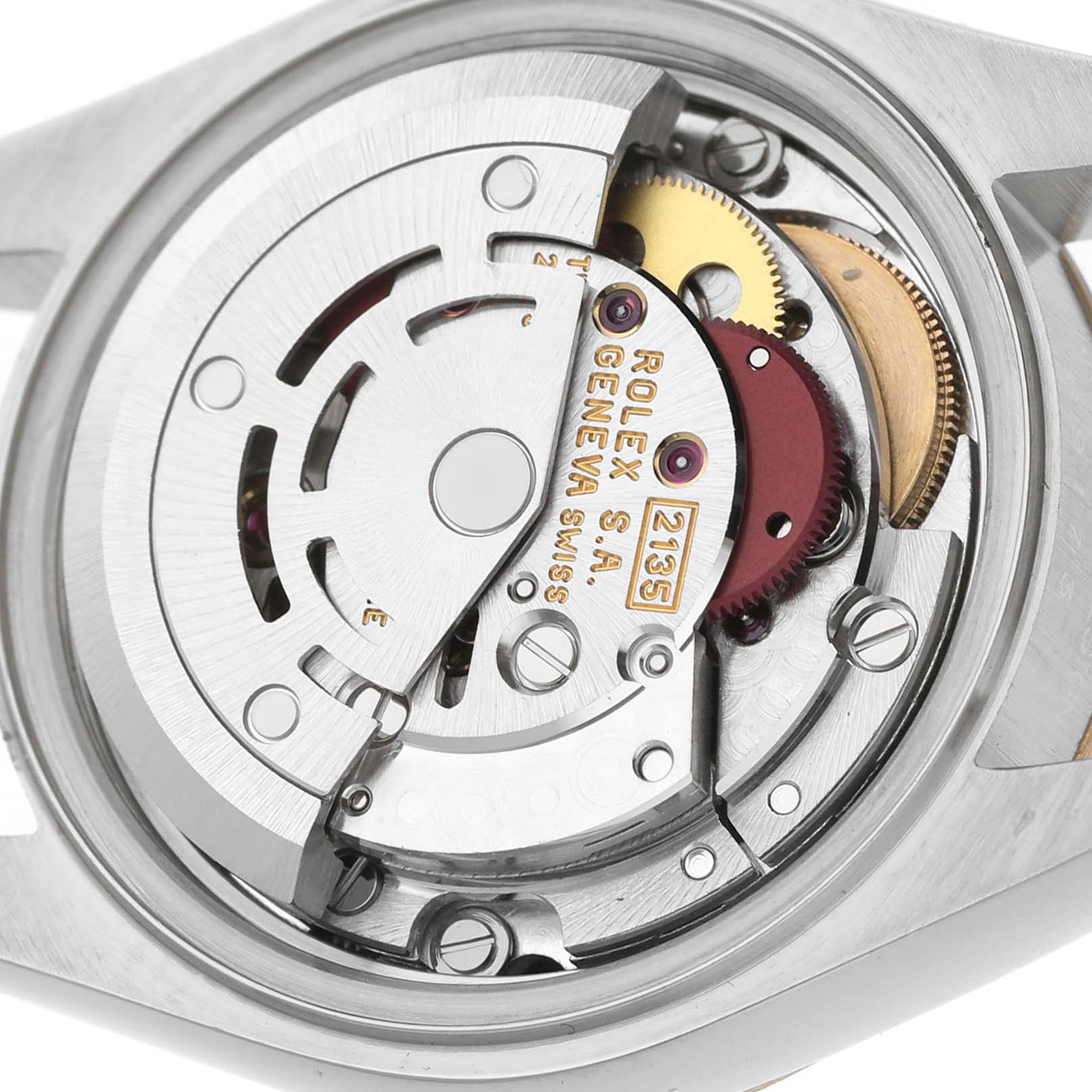 The image shows the movement of a Rolex Datejust 69173 Men's Steel and Gold (two tone) White Dial watch, focusing on intricate internal components seen from the back.