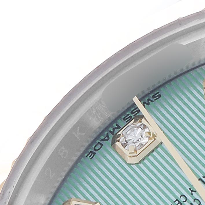The image shows a close-up of the Rolex Datejust 279173 Women's Steel and Gold (two tone) Green Dial 279173 Women's Steel and Gold (two tone) Green Dial, highlighting the bezel, dial with diamond hour markers, and part of the watch hands.