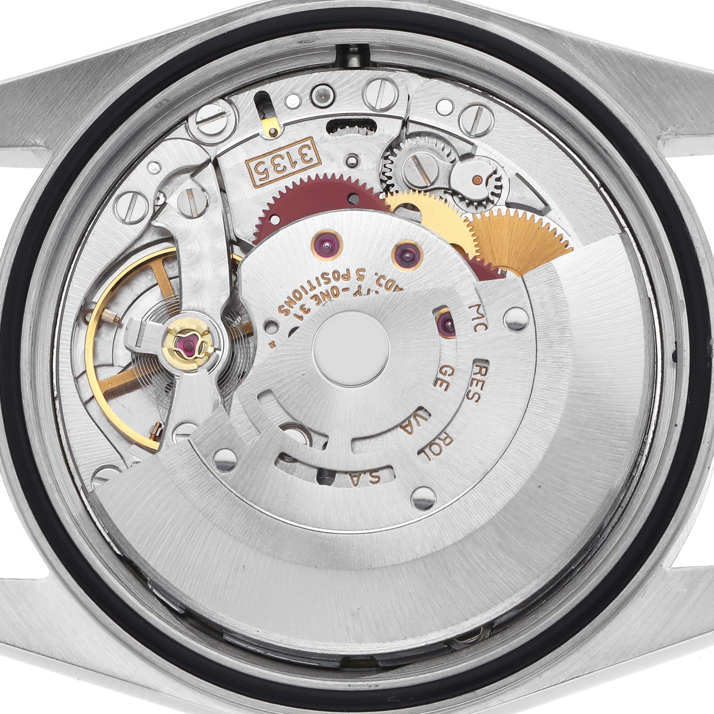 The image shows the movement of a Rolex Datejust 16233 Men's Steel and Gold (two tone) Champagne Dial 16233 Men's Steel and Gold (two tone) Champagne Dial watch from the back, highlighting gears and intricate parts.