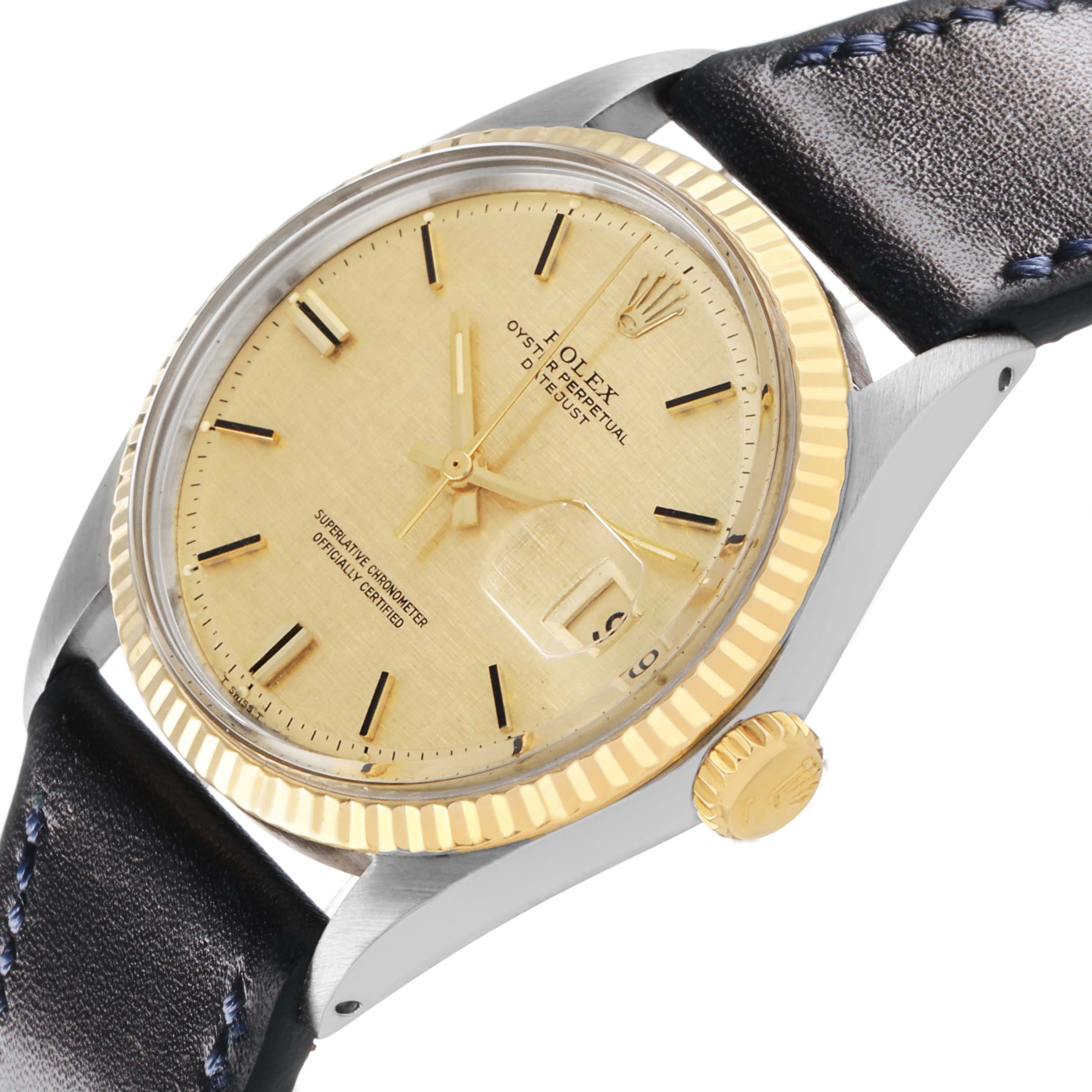 The Rolex Datejust 1601 Men's Steel and Gold (two tone) Champagne Dial watch is shown at an angled view displaying the face, fluted bezel, winding crown, and leather strap.