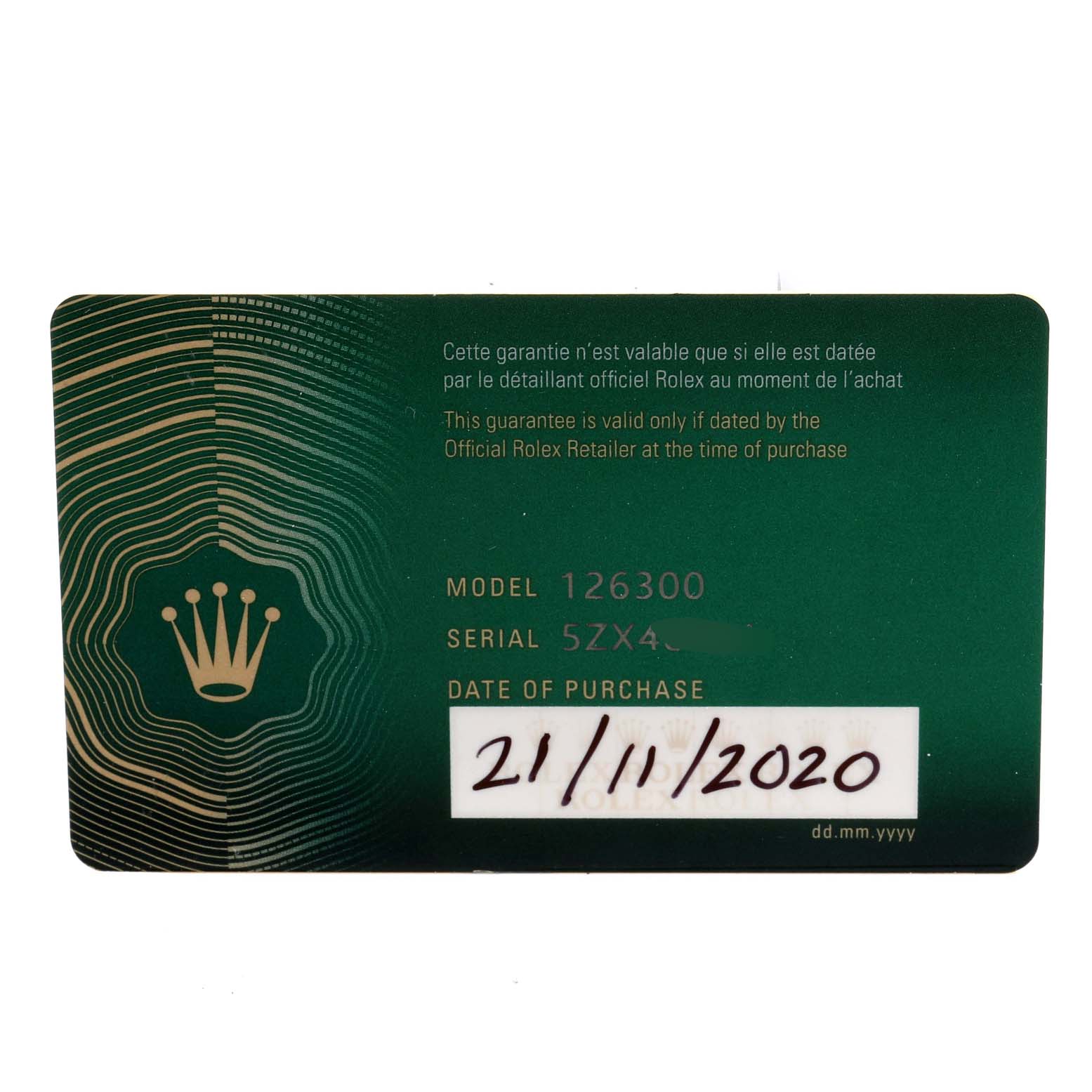 This is an image of the green warranty card for the Rolex Datejust 41 126300 Men's Stainless Steel Blue Dial 126300 Men's Stainless Steel Blue Dial model, displaying model number, serial number, and date of purchase.