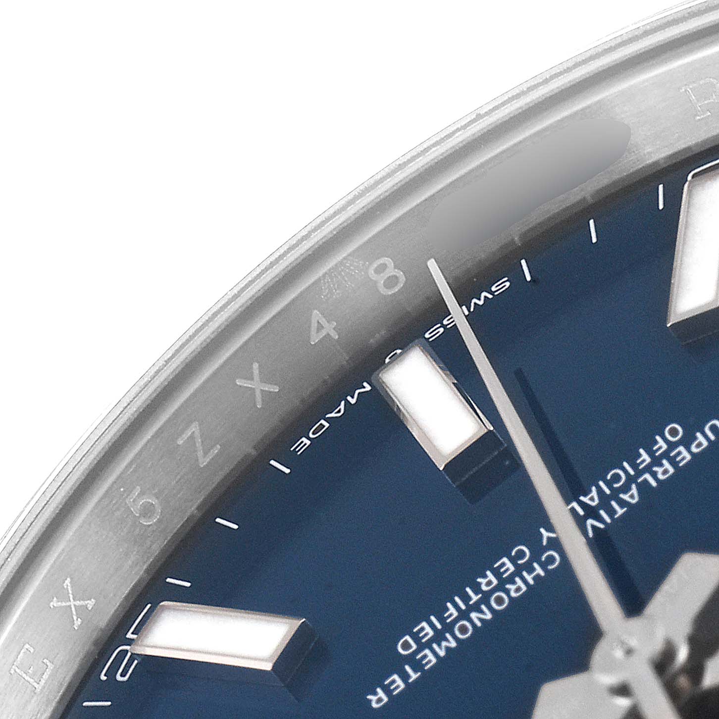 The image shows a close-up of the dial and part of the bezel of a Rolex Datejust 41 126300 Men's Stainless Steel Blue Dial 126300 Men's Stainless Steel Blue Dial watch.
