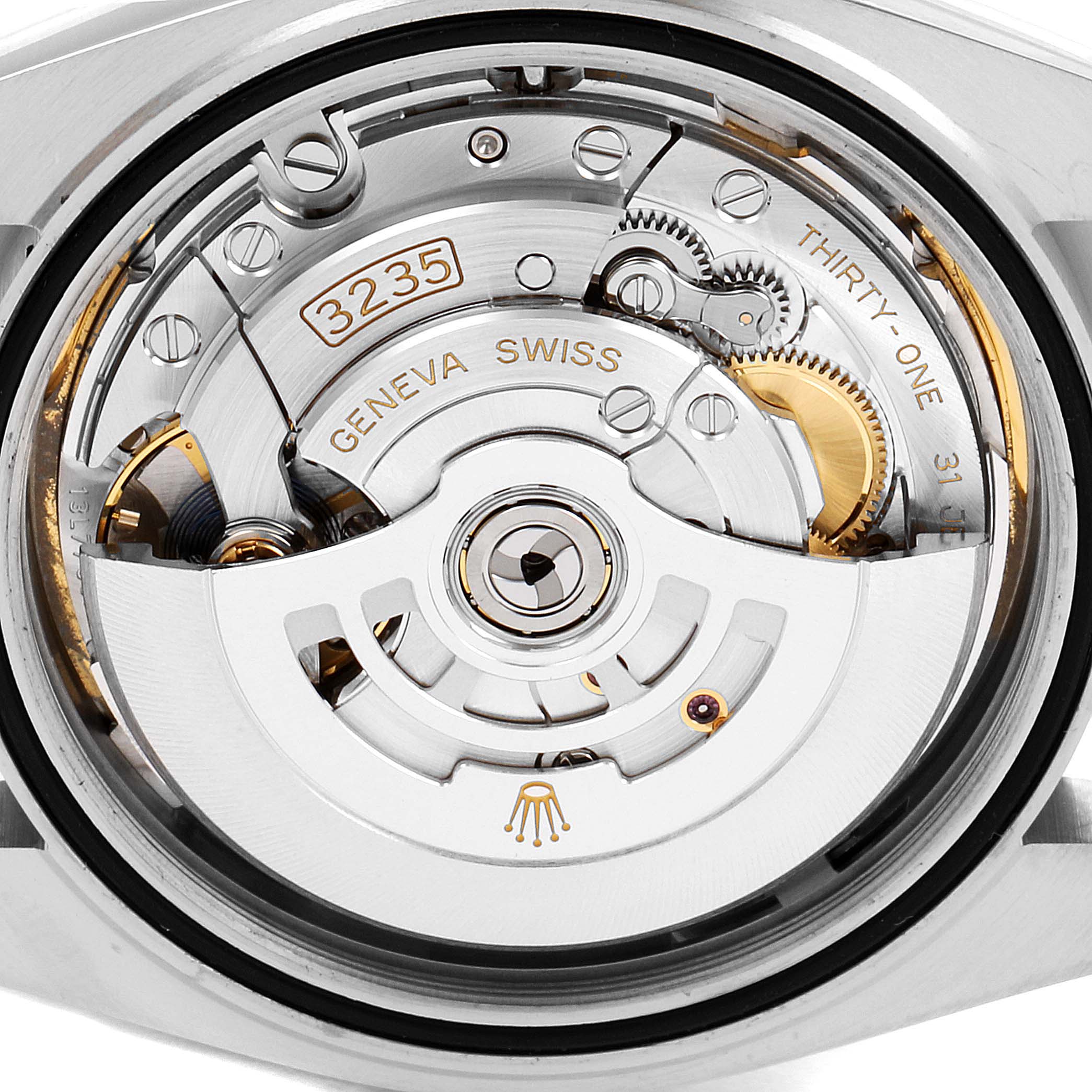 This image shows the movement and internal mechanism of a Rolex Datejust 126334 Men's Stainless Steel White Dial 126334 Men's Stainless Steel White Dial watch from a rear angle.