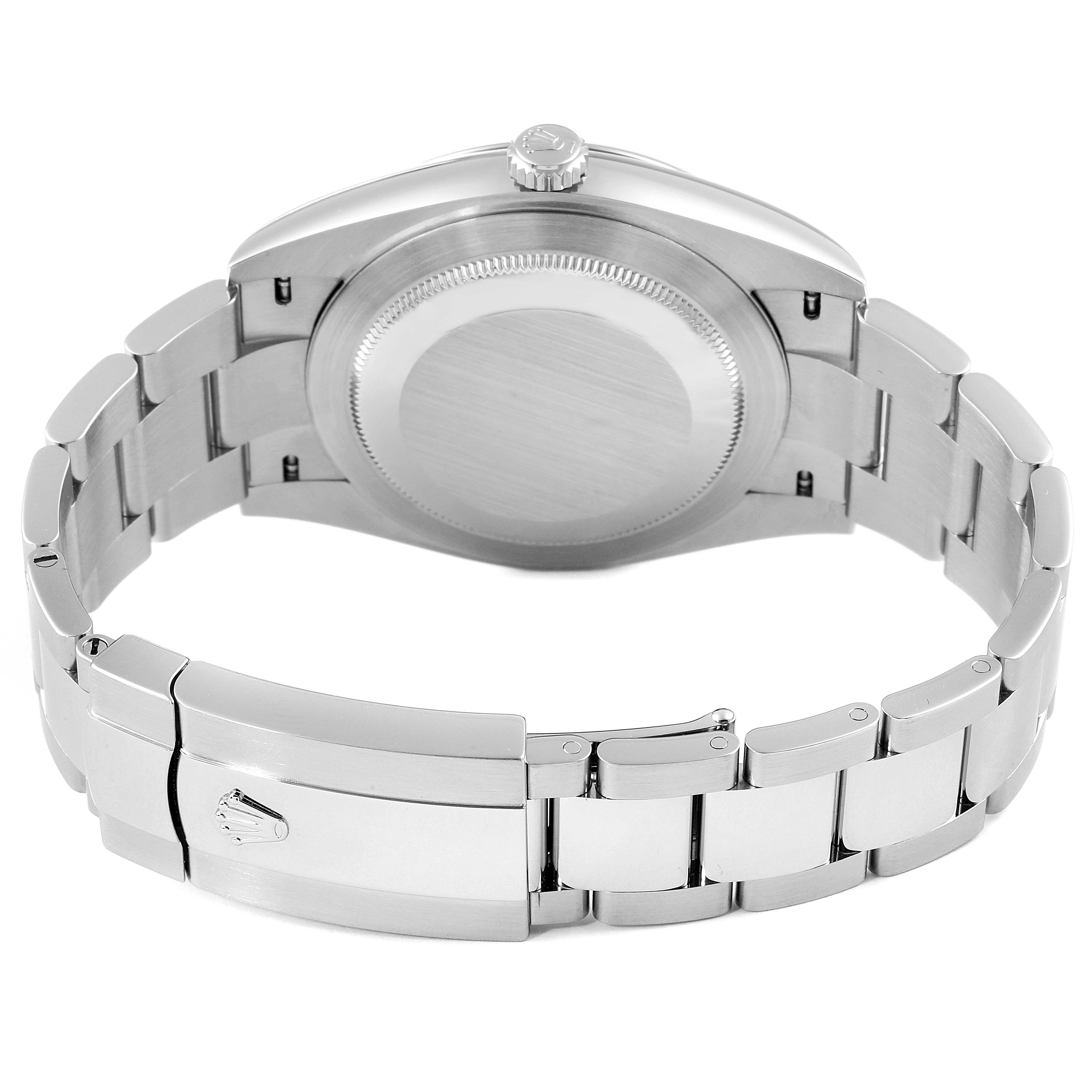 This Rolex Datejust 126334 Men's Stainless Steel White Dial 126334 Men's Stainless Steel White Dial watch is shown from the back, displaying its case back and metal bracelet with clasp.