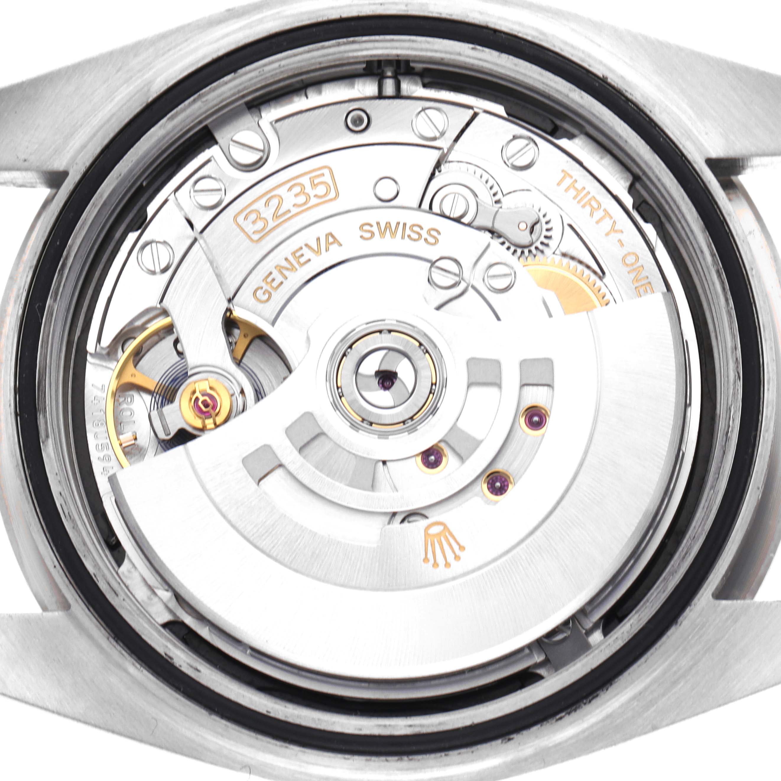 The image shows the movement of a Rolex Datejust 41 126334 Men's Stainless Steel Black Dial 126334 Men's Stainless Steel Black Dial from a top-down angle, highlighting its internal mechanical components.