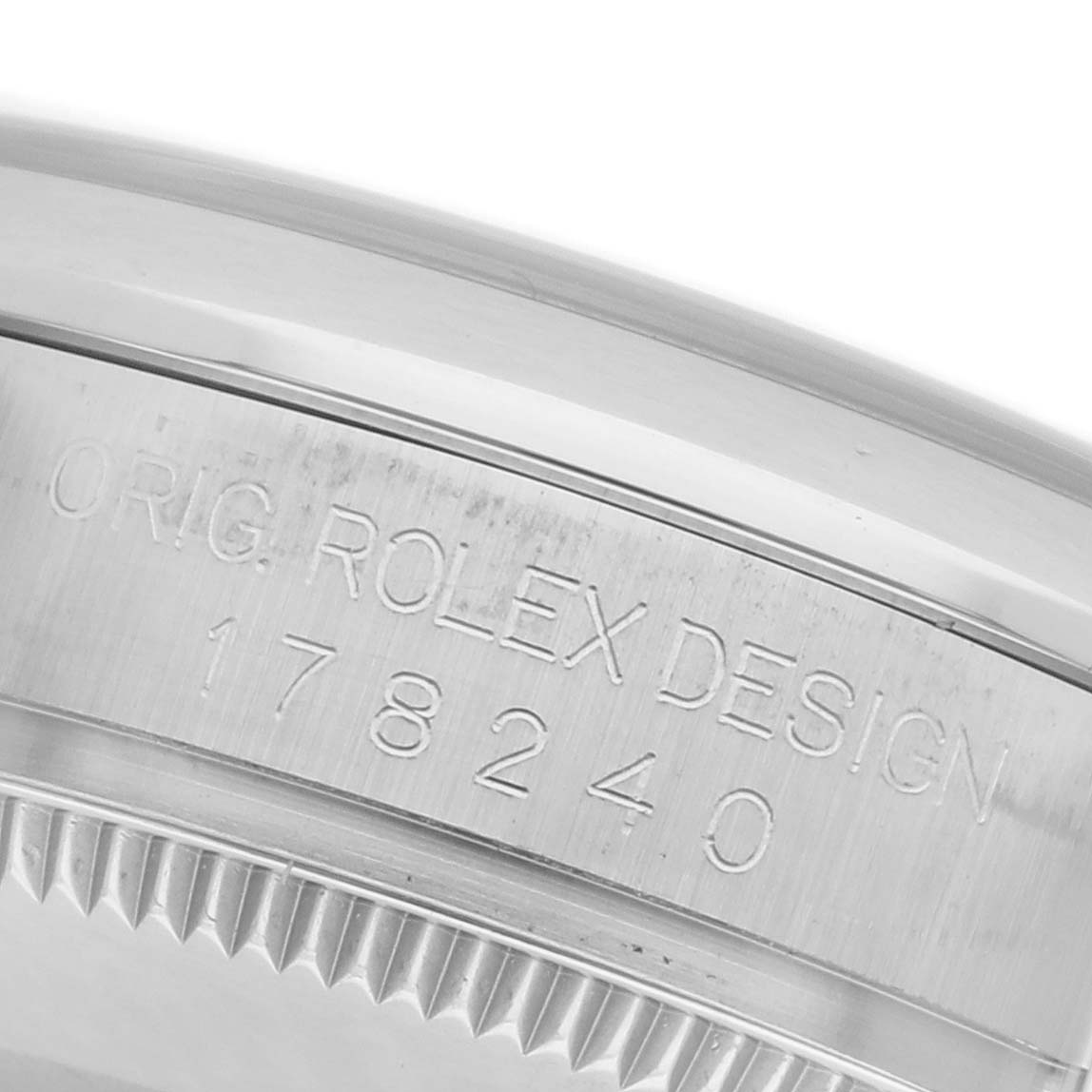 The image shows a close-up of the Rolex Mid-Size 178240 Women's Stainless Steel Silver Dial 178240 Women's Stainless Steel Silver Dial watch case with engraved model number 178240.