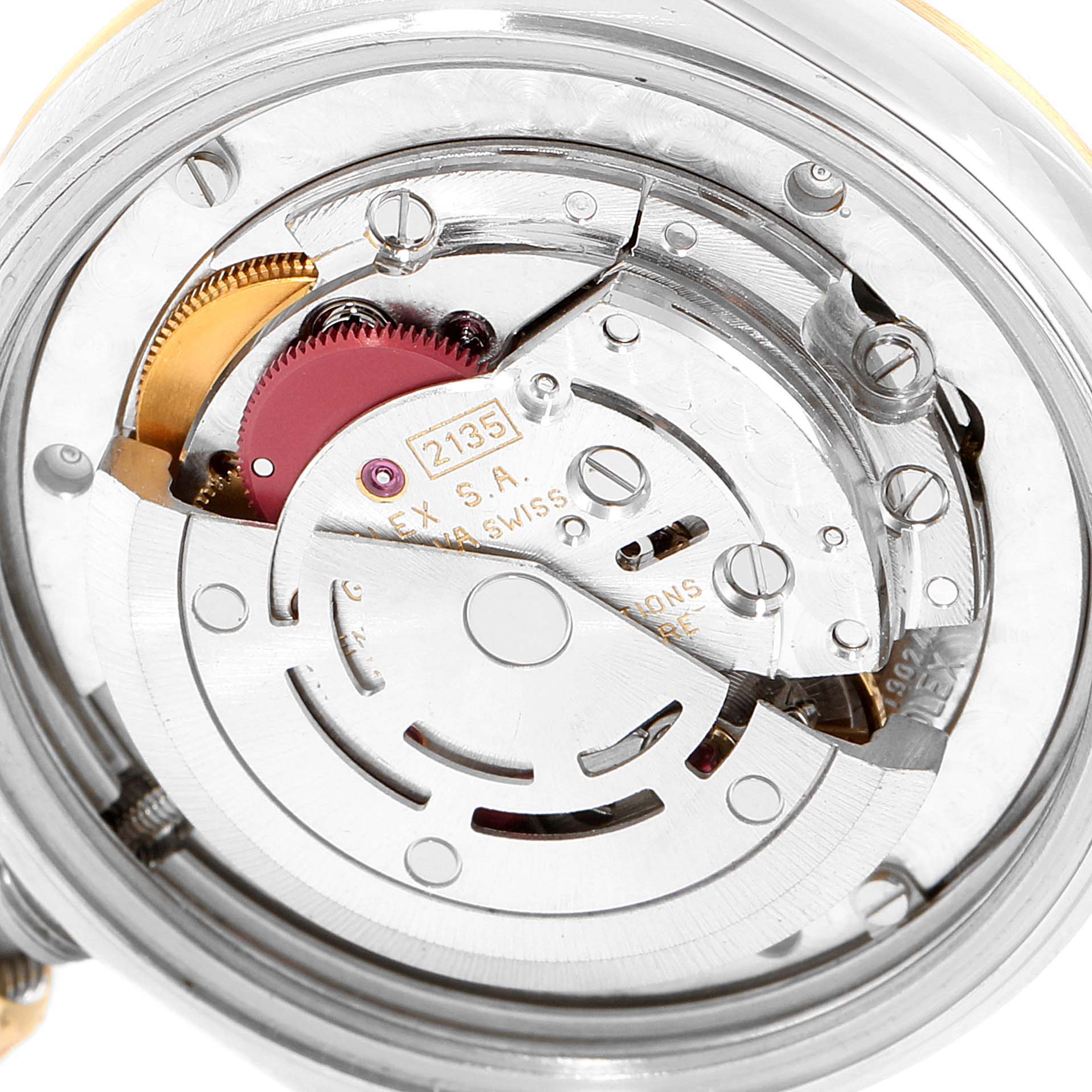 This image shows a close-up of the internal movement parts of a Rolex Mid-Size 68273 Women
s Steel and Gold (two tone) Silver Dial 68273 Women
s Steel and Gold (two tone) Silver Dial model watch.