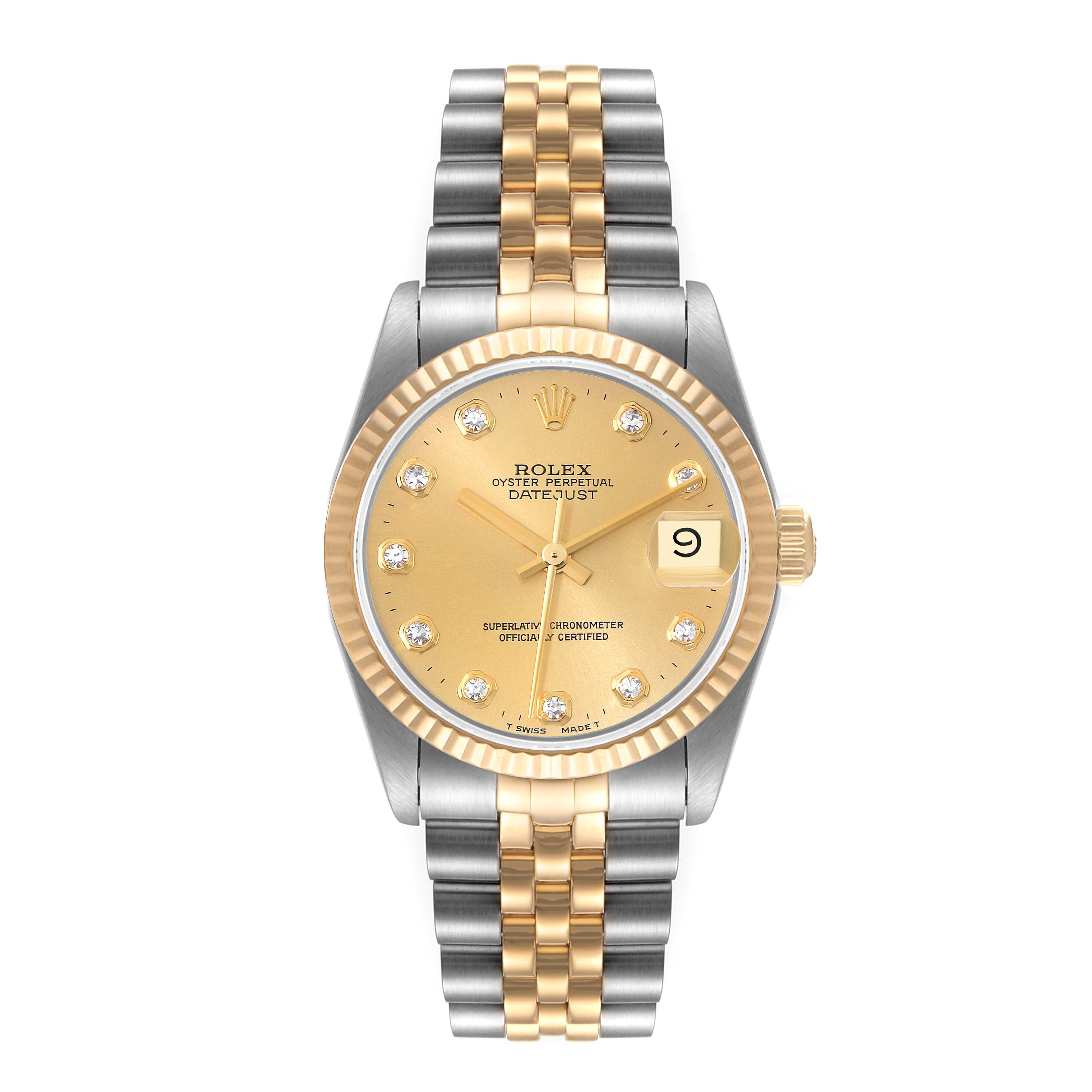 This image shows a frontal view of a Rolex Mid-Size 68273 Women
s Steel and Gold (two tone) Champagne Dial 68273 Women
s Steel and Gold (two tone) Champagne Dial Datejust watch, featuring a gold and silver two-tone bracelet and a gold dial.
