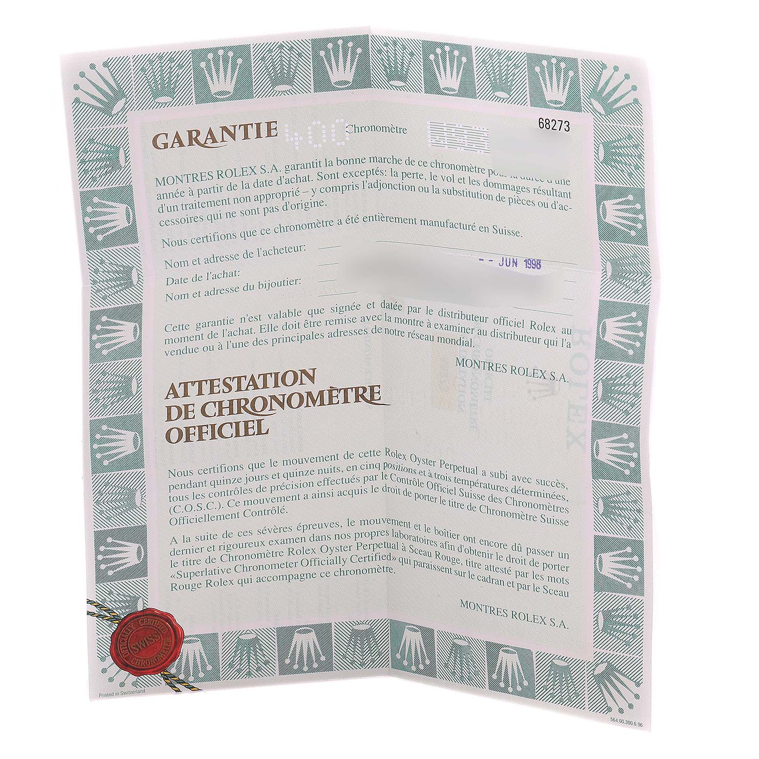 This is a warranty certificate for a Mid-Size Rolex watch, displaying text and a red seal, oriented upright.