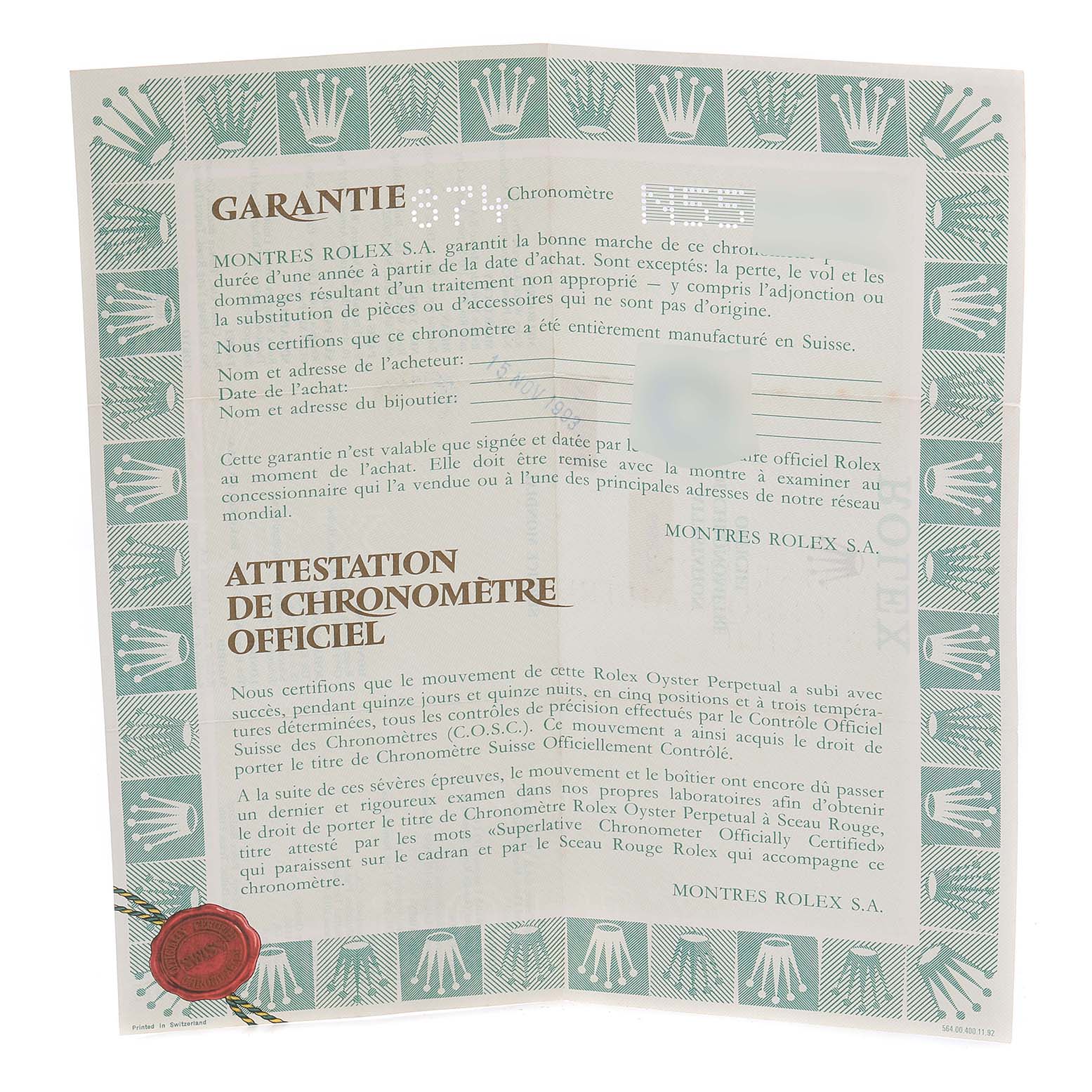 This image shows a warranty and official chronometer certification document for a Mid-Size Rolex watch.