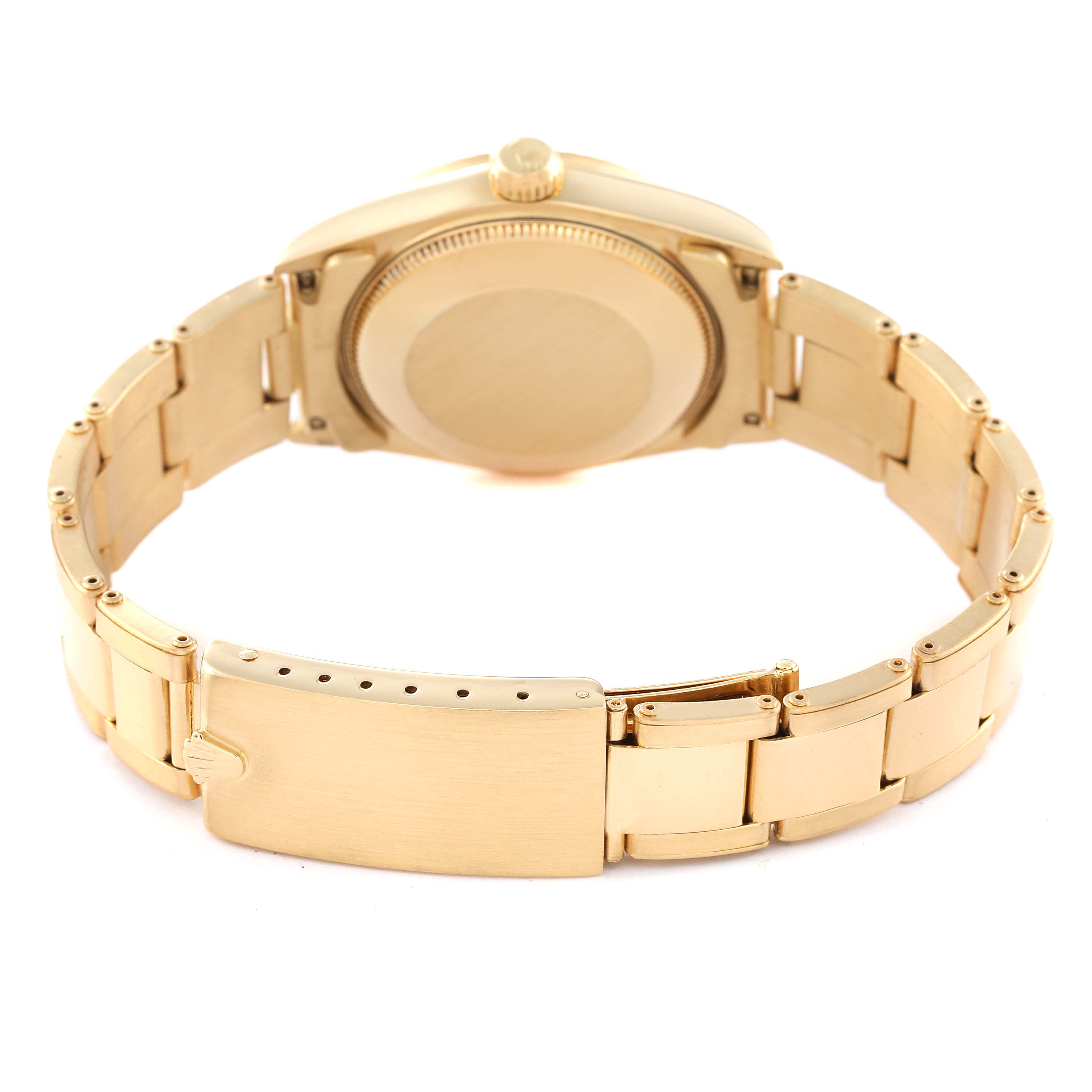 The image shows the back view of a Rolex President 68278 Women's Yellow Gold Champagne Dial 68278 Women's Yellow Gold Champagne Dial model watch, highlighting the case back and bracelet clasp.