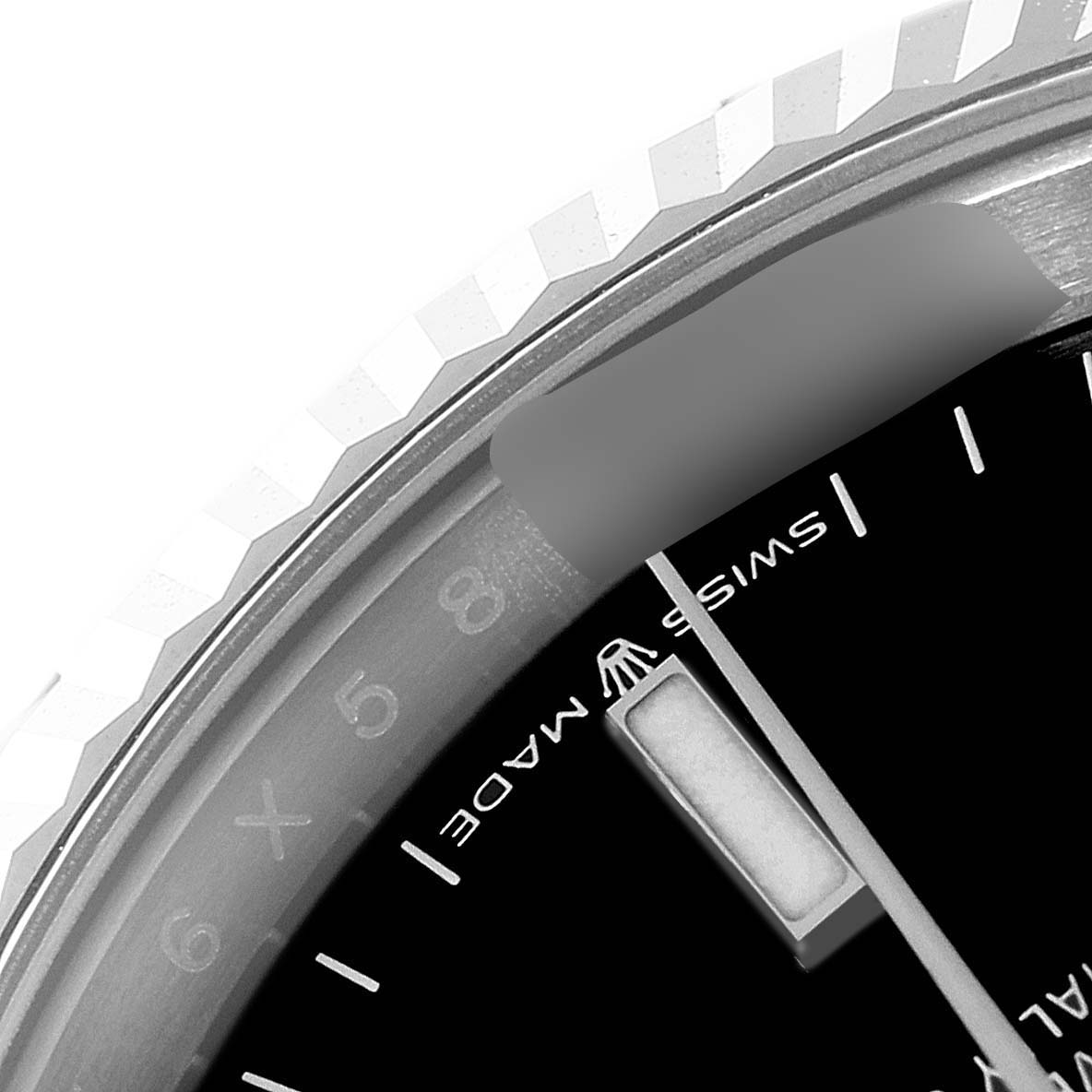 The image shows a close-up of the Rolex Datejust 126234 Men's Stainless Steel Black Dial 126234 Men's Stainless Steel Black Dial watch, focusing on its bezel, part of the dial with hour markers, and the "Swiss Made" text.