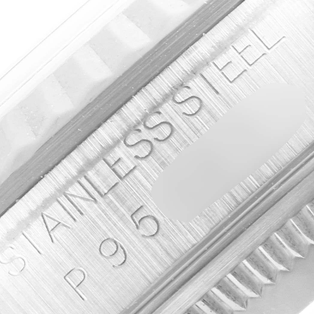 This image shows a close-up of the stainless steel case details and a portion of the bezel of a Rolex Datejust 16234 Men
s Stainless Steel Black Dial 16234 Men
s Stainless Steel Black Dial watch.