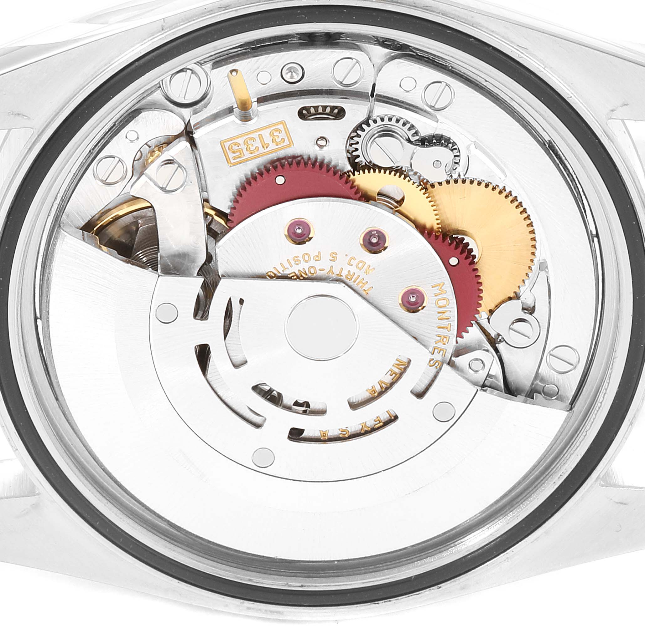 This image shows the inner mechanical movement of the Rolex Datejust 16234 Men
s Stainless Steel Black Dial 16234 Men
s Stainless Steel Black Dial watch, highlighting gears and components.
