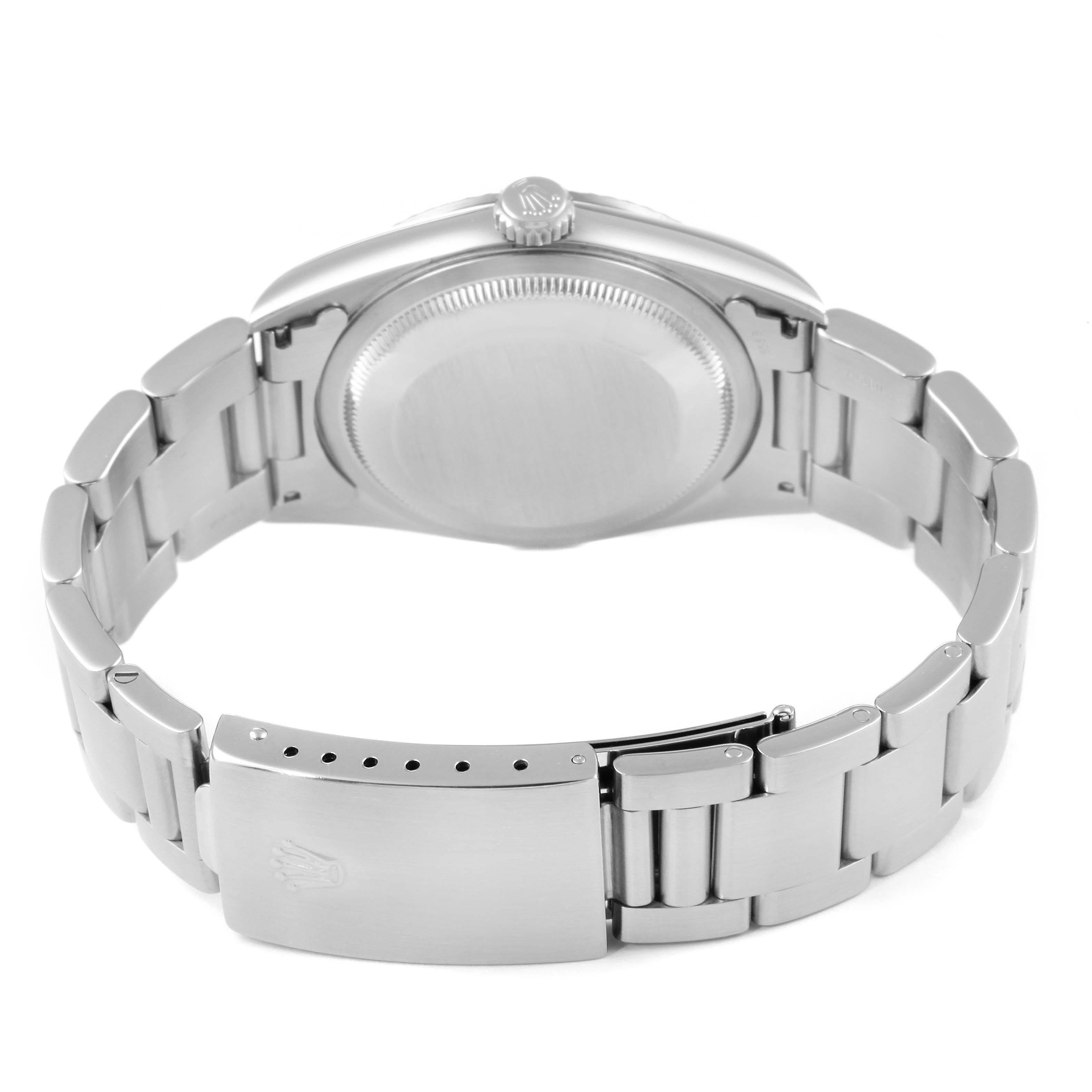 This image shows the back view of a Rolex Datejust 16234 Men
s Stainless Steel Black Dial 16234 Men
s Stainless Steel Black Dial watch focusing on the case back and the bracelet clasp.