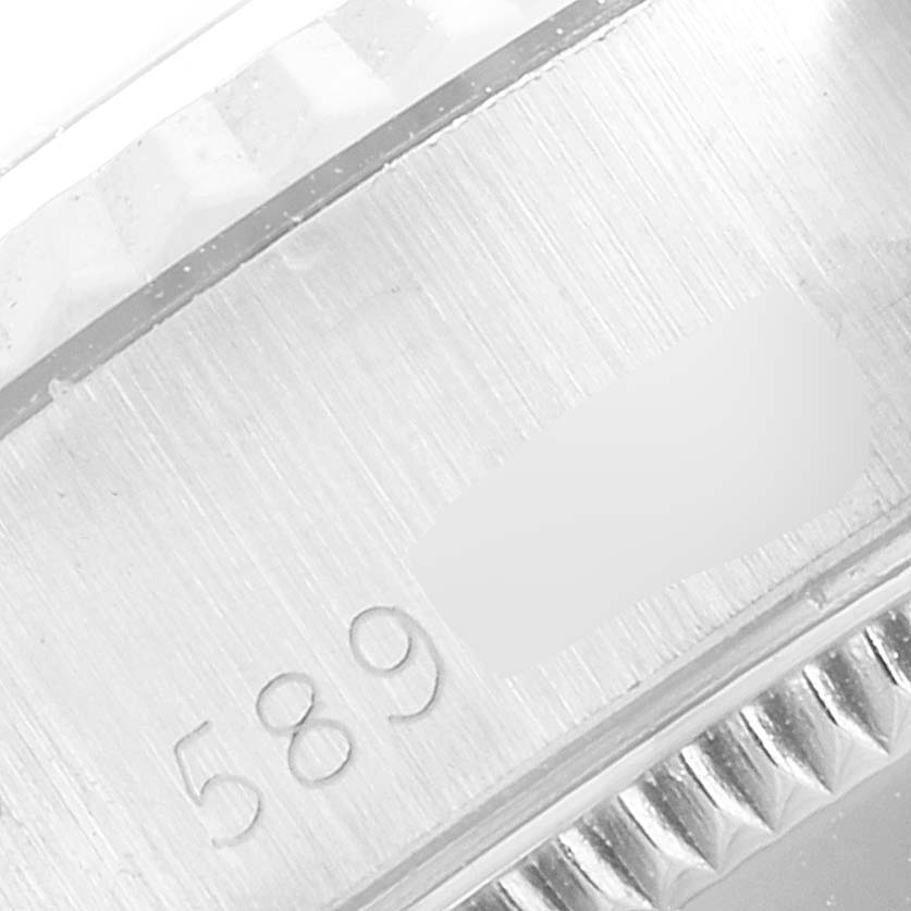 The image shows a close-up angle of the case and bezel of a Rolex Datejust 6917 Women's Stainless Steel Silver Dial 6917 Women's Stainless Steel Silver Dial watch, with "589" engraved on it.