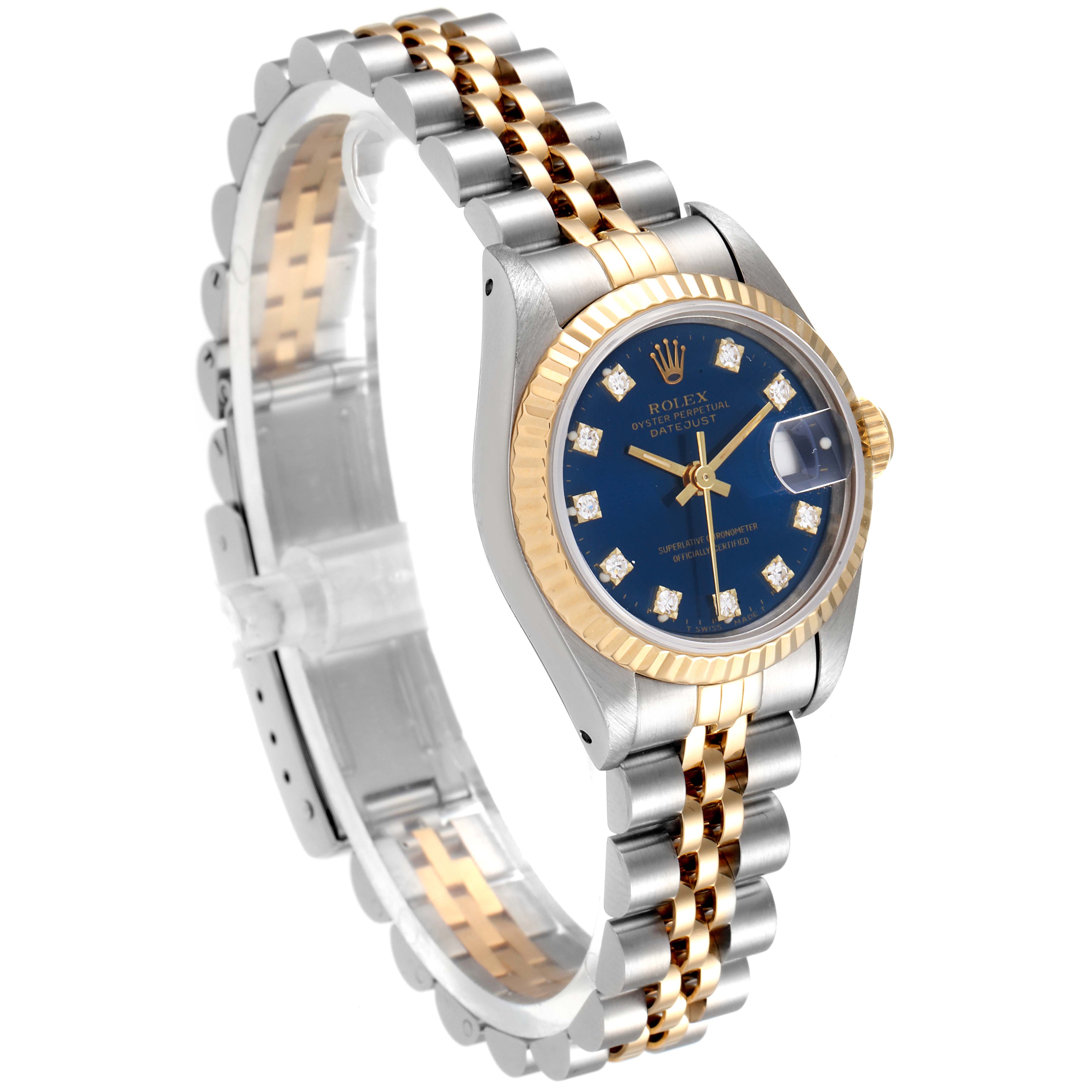 The image shows a Rolex Datejust 69173 Women's Steel and Gold (two tone) Blue Dial 69173 Women's Steel and Gold (two tone) Blue Dial watch at a three-quarter angle, highlighting its blue dial, gold fluted bezel, and two-tone bracelet.