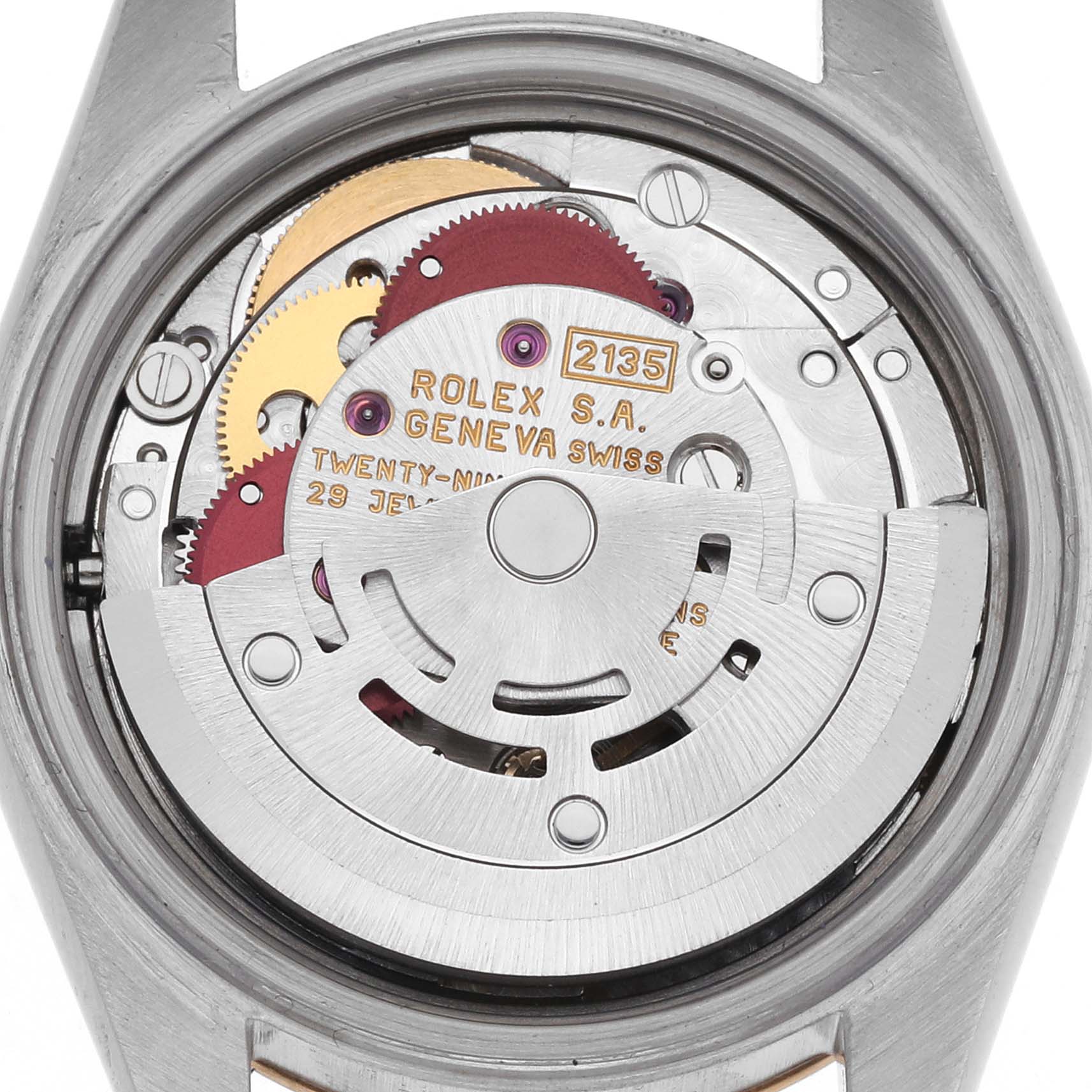 The image shows the movement of a Rolex Datejust 69173 Women's Steel and Gold (two tone) Champagne Dial 69173 Women's Steel and Gold (two tone) Champagne Dial watch from the back, highlighting gears and the rotor mechanism.