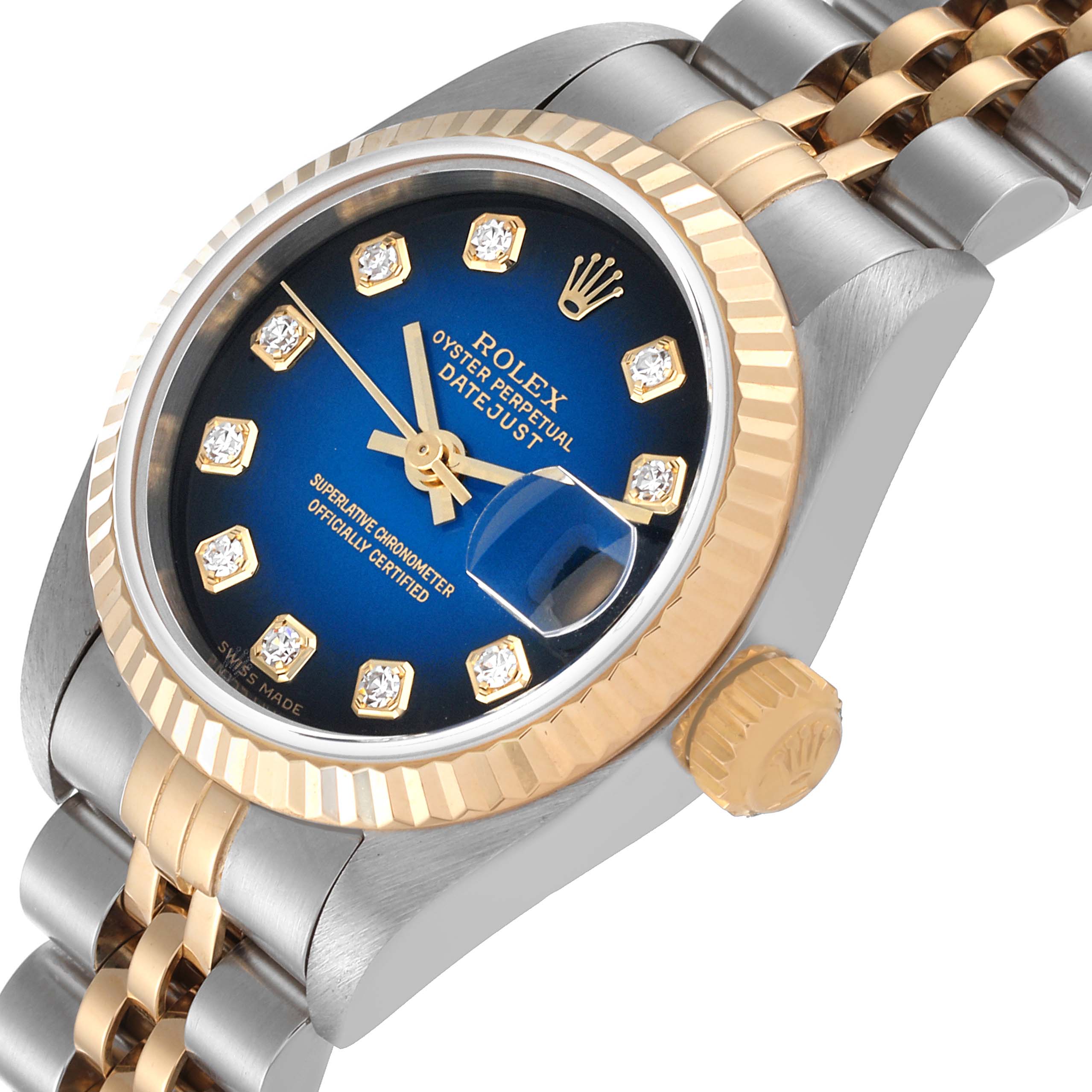 This close-up image of the Rolex Datejust 79173 Women's Steel and Gold (two tone) Blue Dial 79173 Women's Steel and Gold (two tone) Blue Dial watch highlights its blue dial, gold bezel, crown, and two-tone bracelet from an angled view.