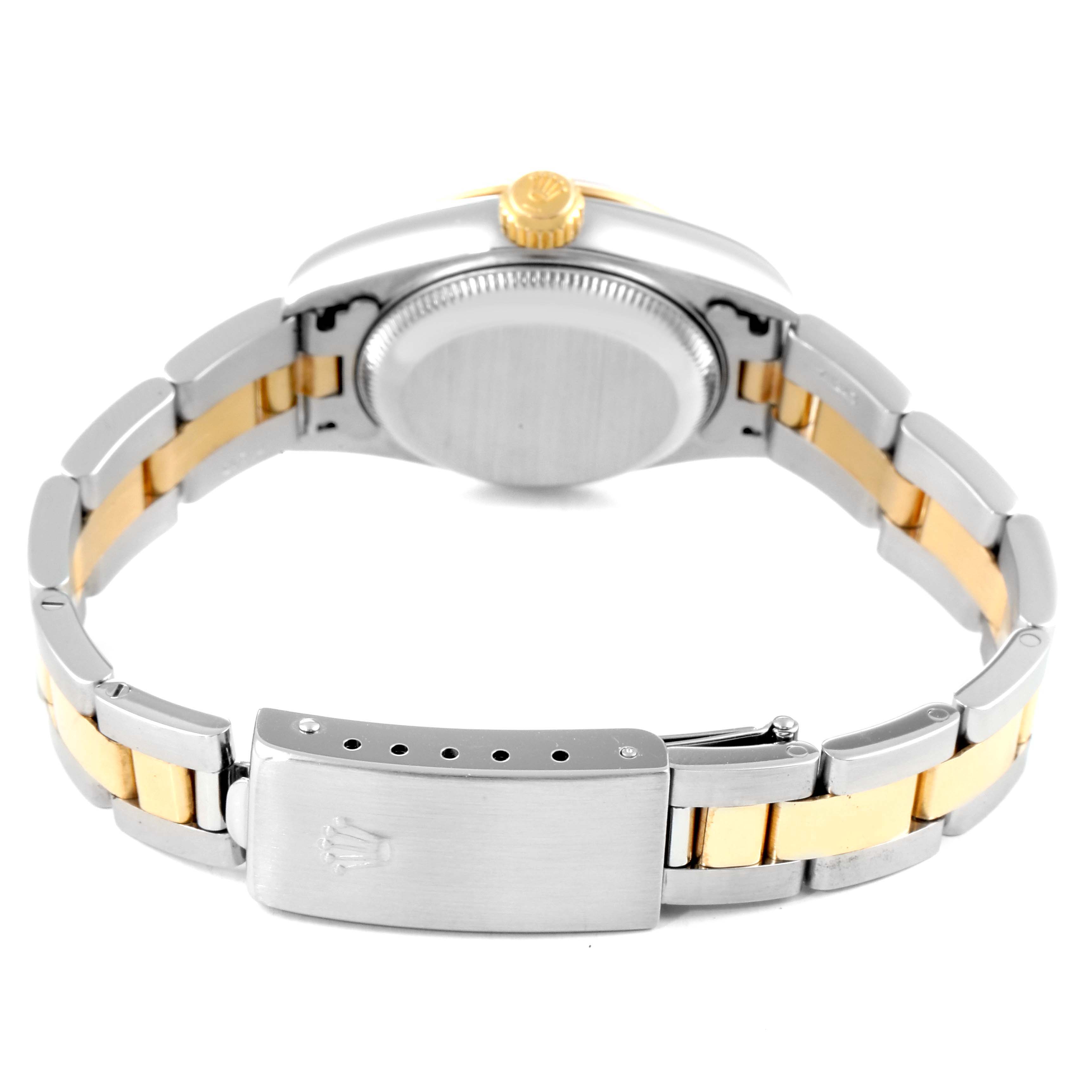 This image shows the backside and bracelet of a Rolex Datejust 79163 Women's Steel and Gold (two tone) Silver Dial 79163 Women's Steel and Gold (two tone) Silver Dial watch, featuring a two-tone metal design.