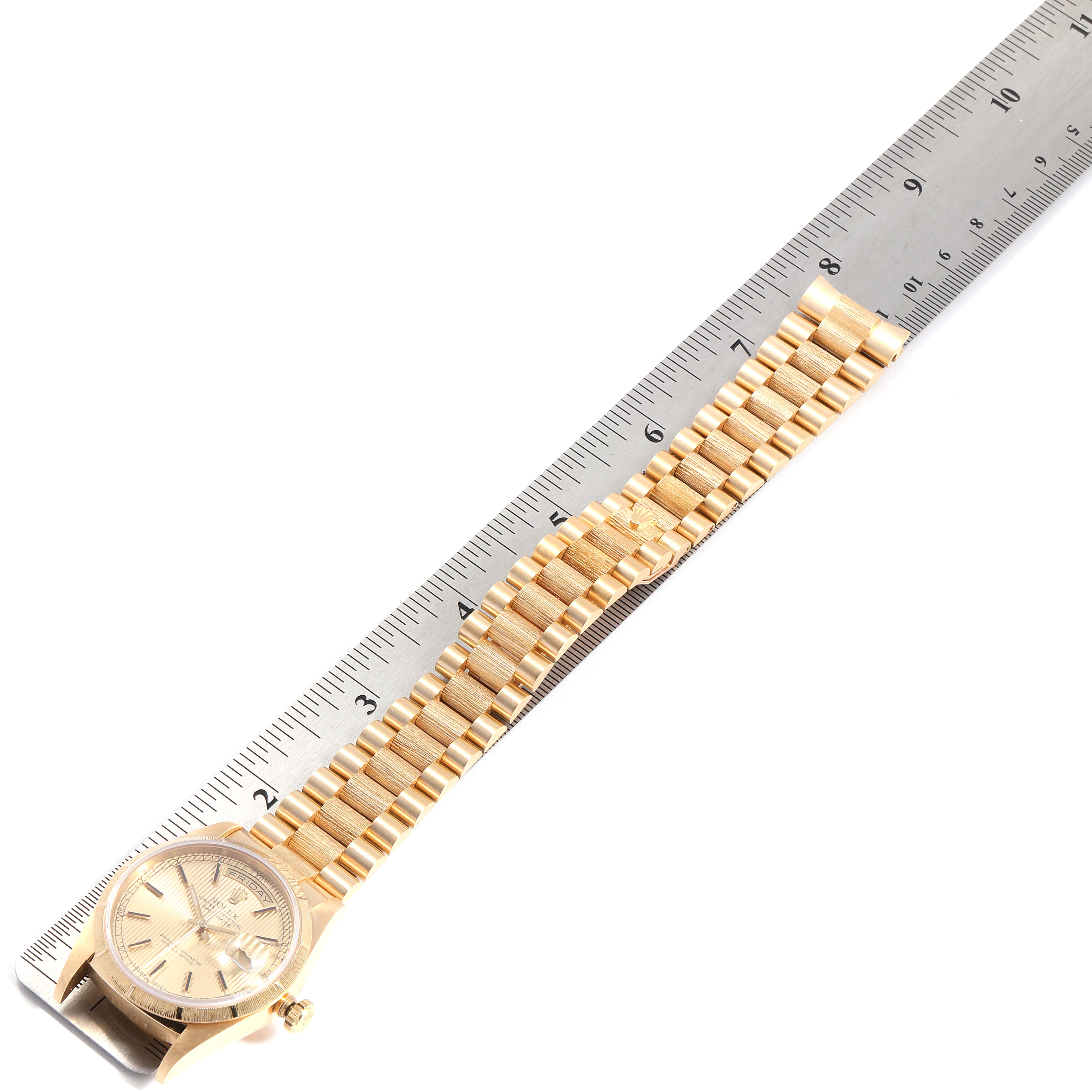 The image shows a Rolex President 18248 Men
s Yellow Gold Champagne Dial 18248 Men
s Yellow Gold Champagne Dial model watch, fully extended, with the dial, bracelet, and a ruler for scale comparison.