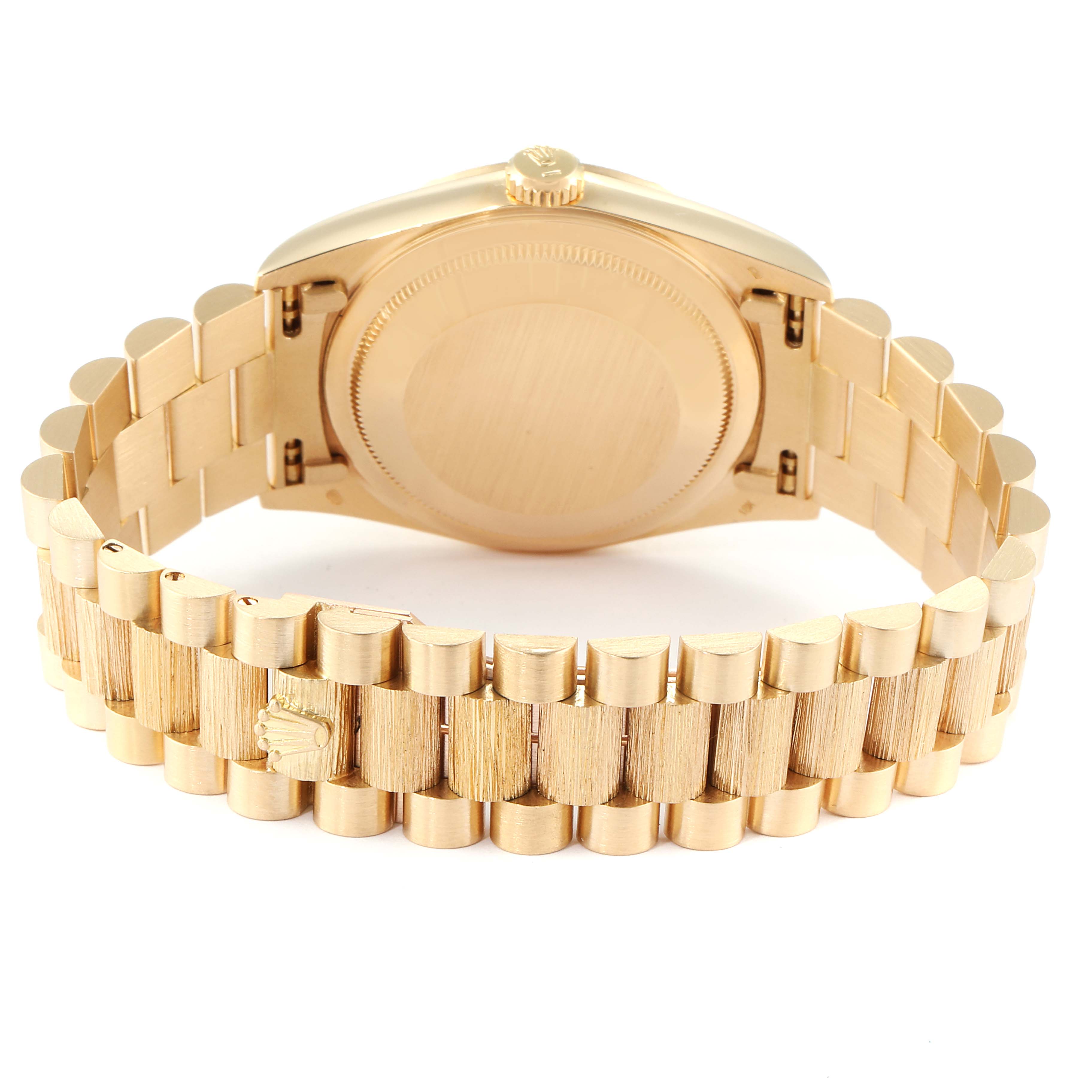 This image shows the back view of a Rolex President 18248 Men
s Yellow Gold Champagne Dial 18248 Men
s Yellow Gold Champagne Dial model watch, focusing on the case back and bracelet.
